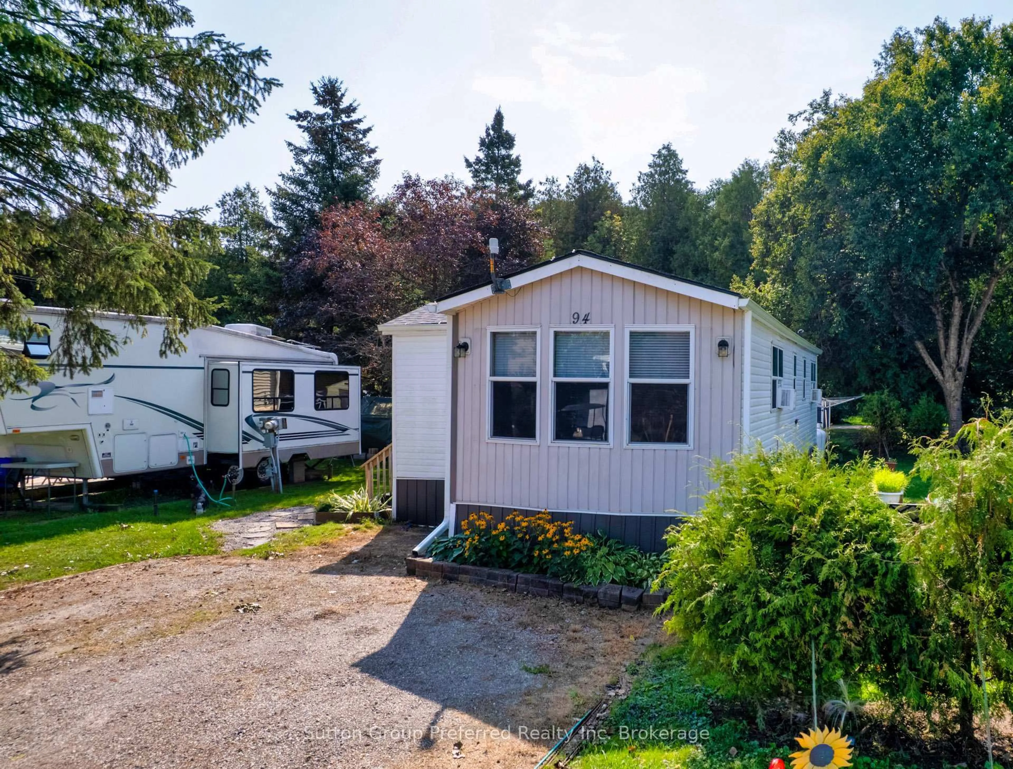 Home with vinyl exterior material, street for 495856 10th Line #94, East Zorra-Tavistock Ontario N4S 7V7