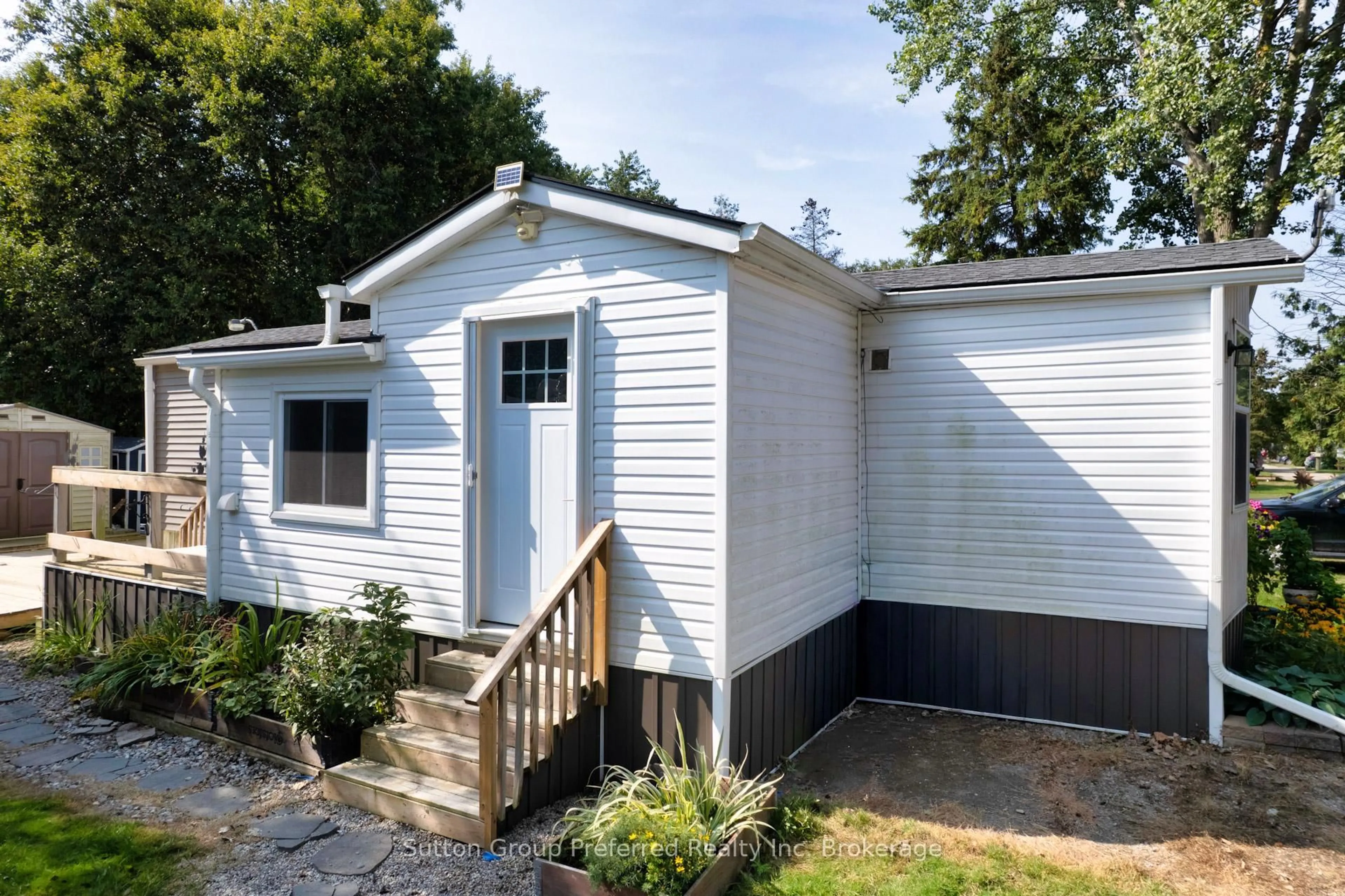 Home with vinyl exterior material, street for 495856 10th Line #94, East Zorra-Tavistock Ontario N4S 7V7