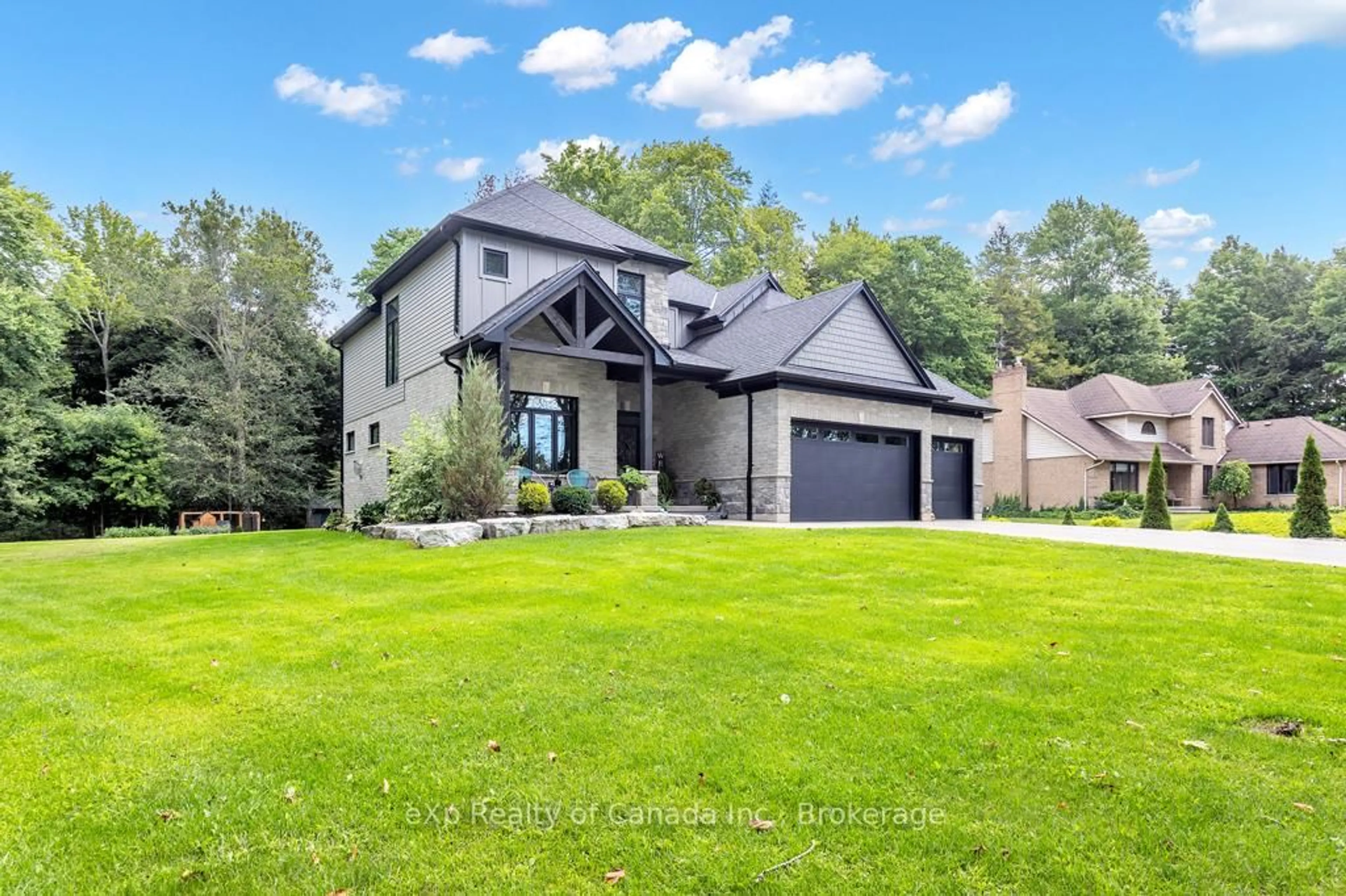 Home with brick exterior material, unknown for 104 Norfolk County 13 Rd, Norfolk Ontario N0J 1E0