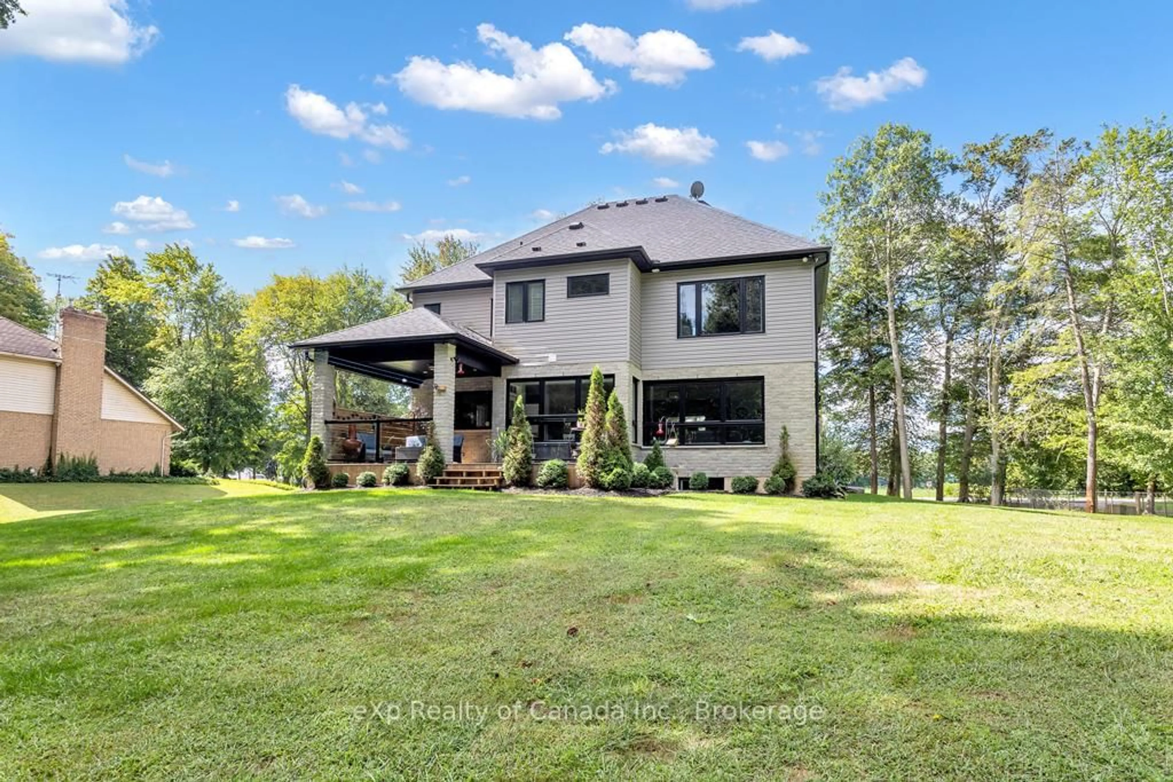 A pic from outside/outdoor area/front of a property/back of a property/a pic from drone, water/lake/river/ocean view for 104 Norfolk County 13 Rd, Norfolk Ontario N0J 1E0