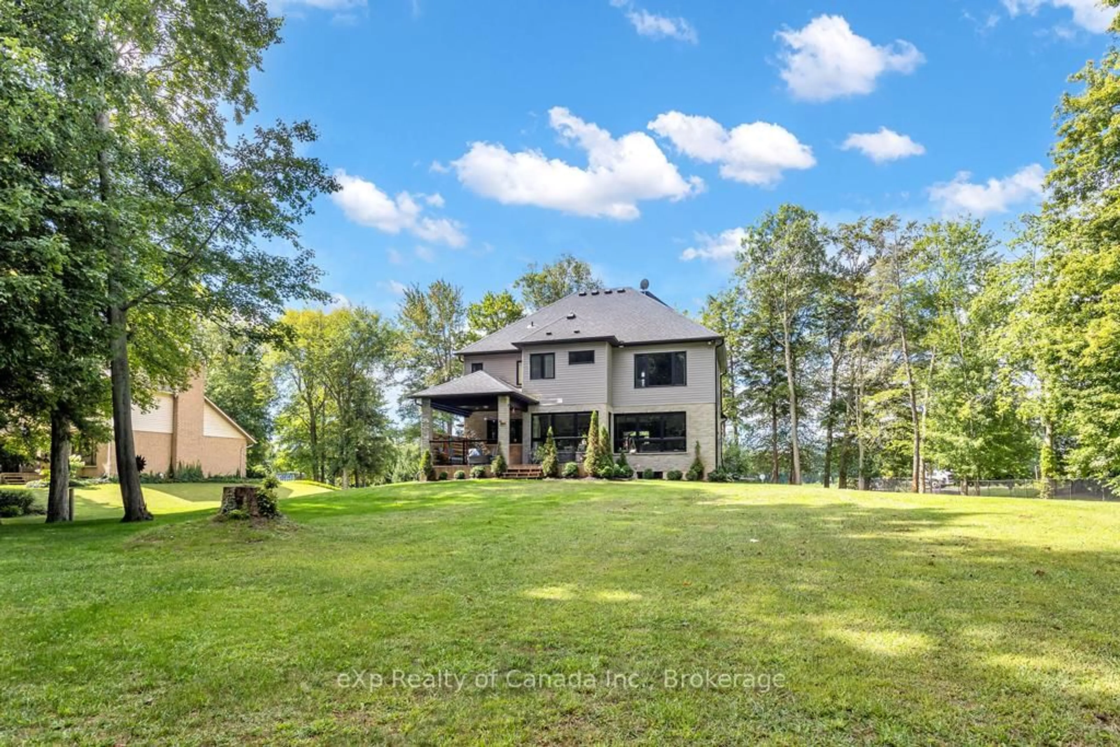 A pic from outside/outdoor area/front of a property/back of a property/a pic from drone, water/lake/river/ocean view for 104 Norfolk County 13 Rd, Norfolk Ontario N0J 1E0