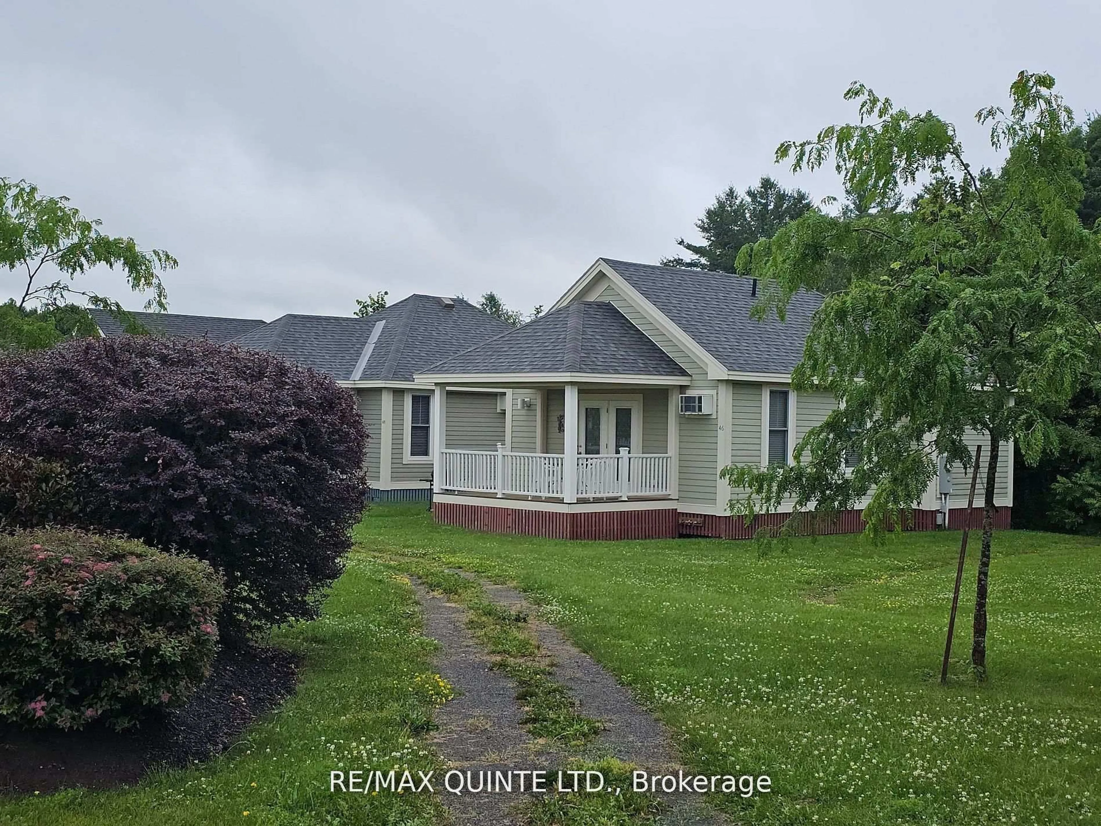 A pic from outside/outdoor area/front of a property/back of a property/a pic from drone, unknown for 46 Meadow View Lane #19, Prince Edward County Ontario K0K 1P0