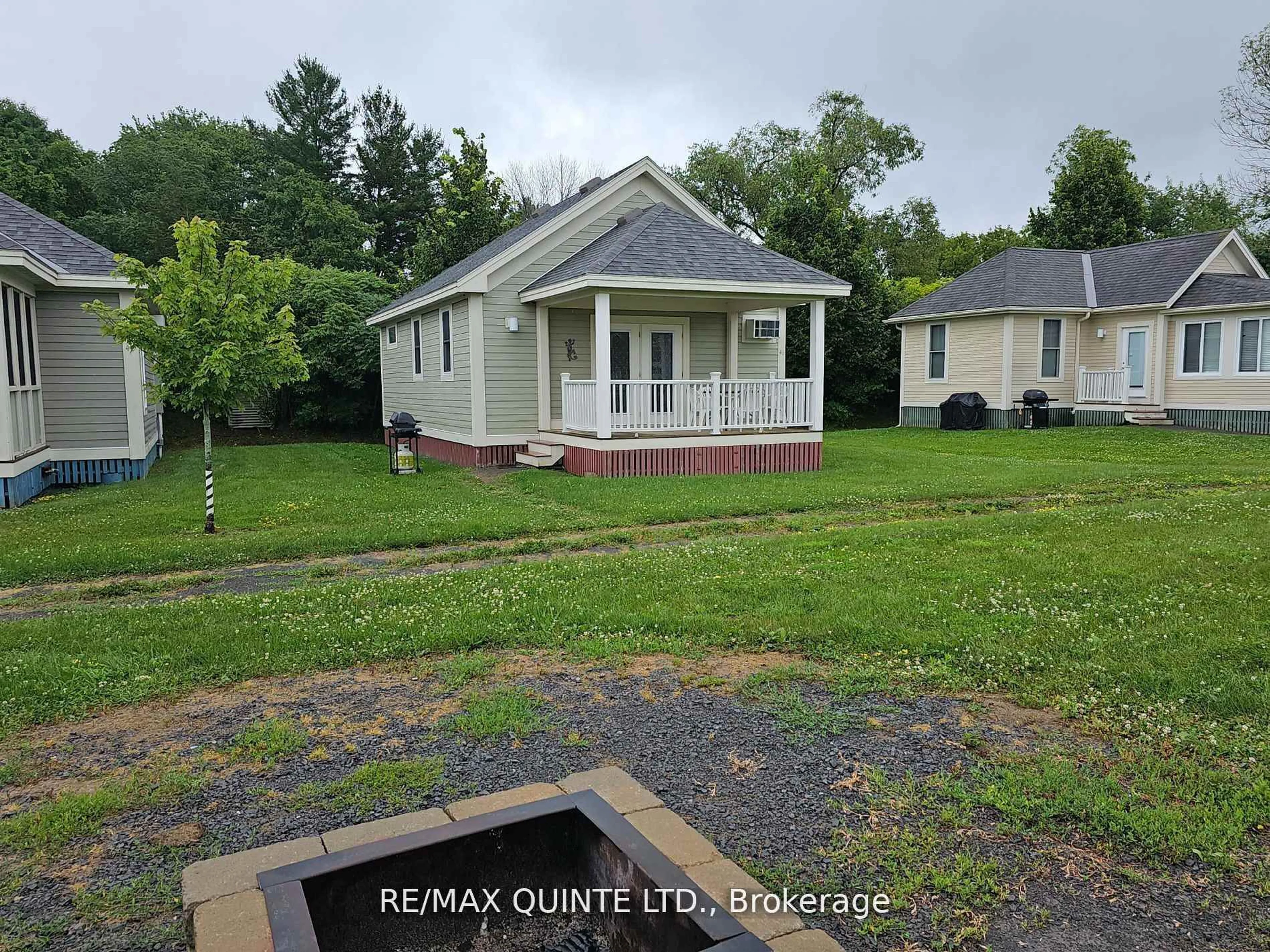 A pic from outside/outdoor area/front of a property/back of a property/a pic from drone, street for 46 Meadow View Lane #19, Prince Edward County Ontario K0K 1P0