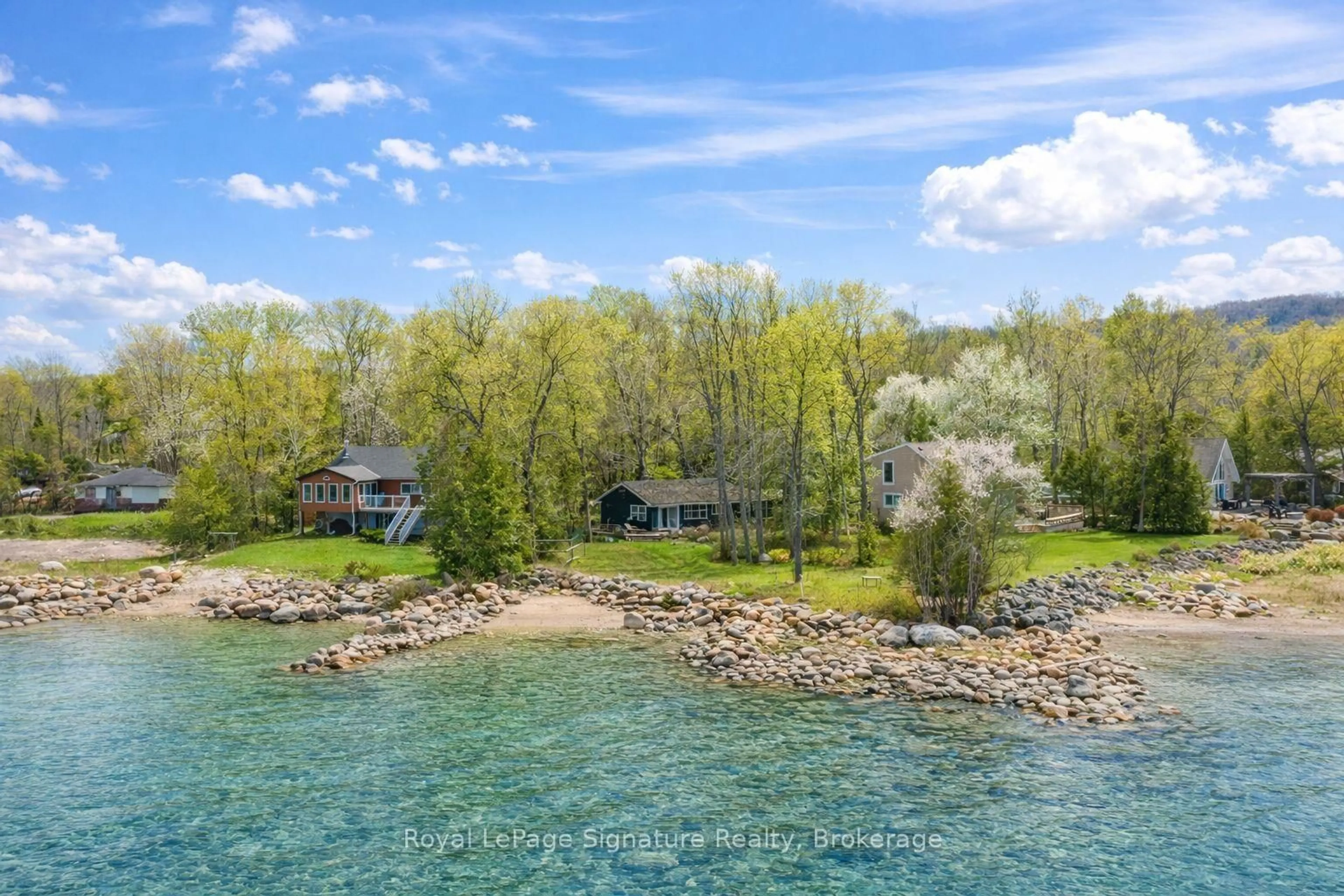 A pic from outside/outdoor area/front of a property/back of a property/a pic from drone, water/lake/river/ocean view for 129 Sunset Blvd, Blue Mountains Ontario N0H 2P0