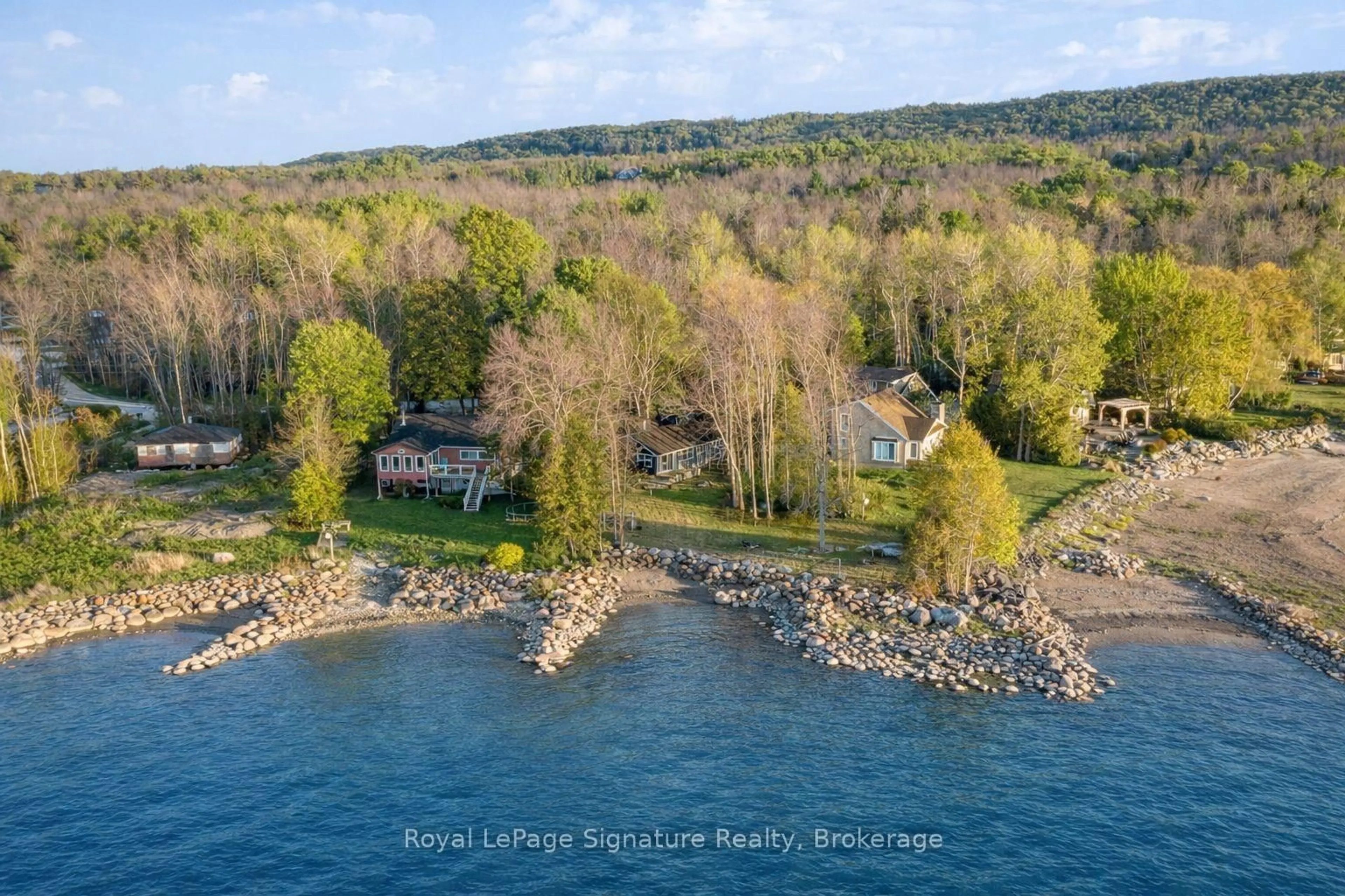 A pic from outside/outdoor area/front of a property/back of a property/a pic from drone, water/lake/river/ocean view for 129 Sunset Blvd, Blue Mountains Ontario N0H 2P0