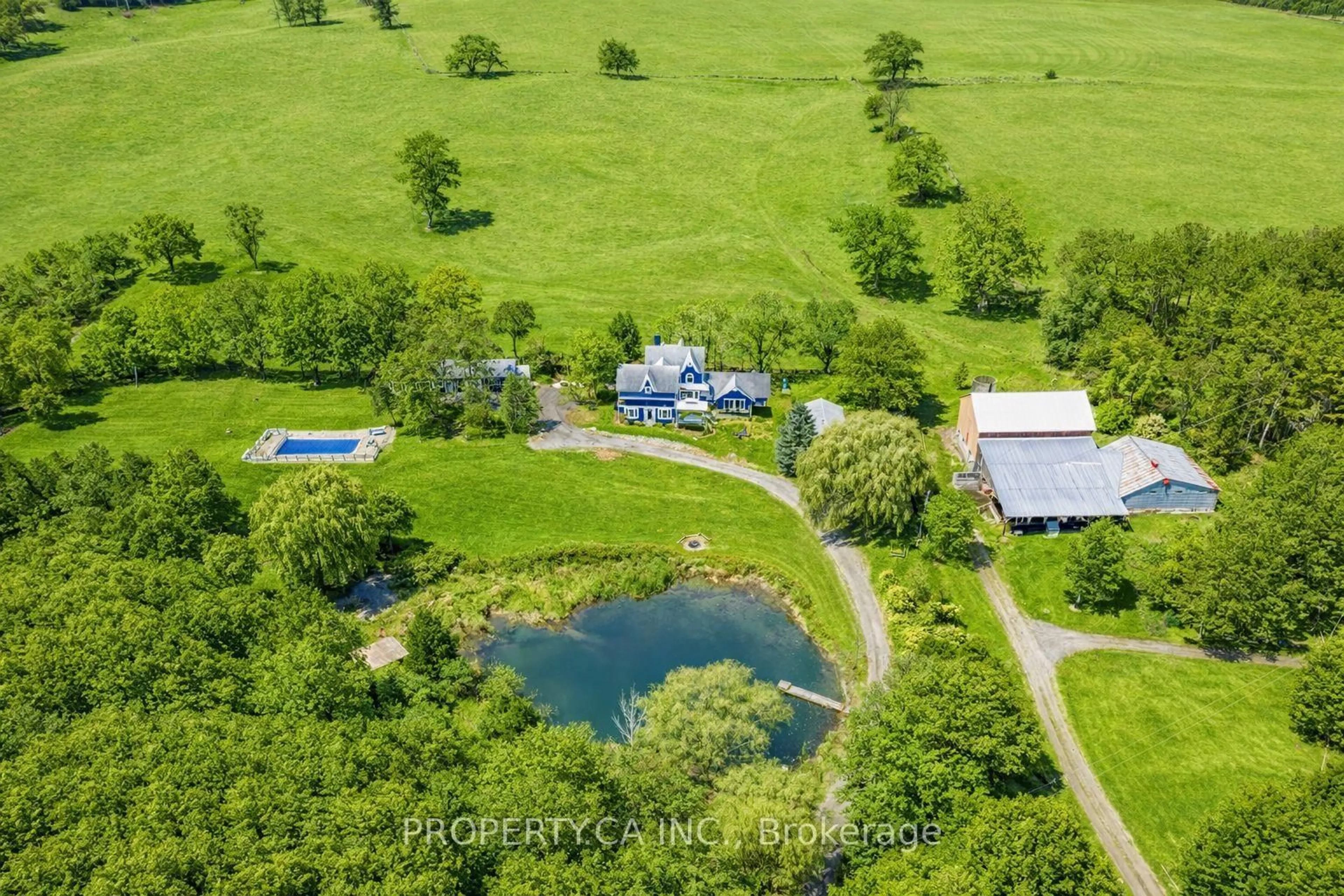 A pic from outside/outdoor area/front of a property/back of a property/a pic from drone, water/lake/river/ocean view for 876382 5th Line, Mulmur Ontario L9V 0J9