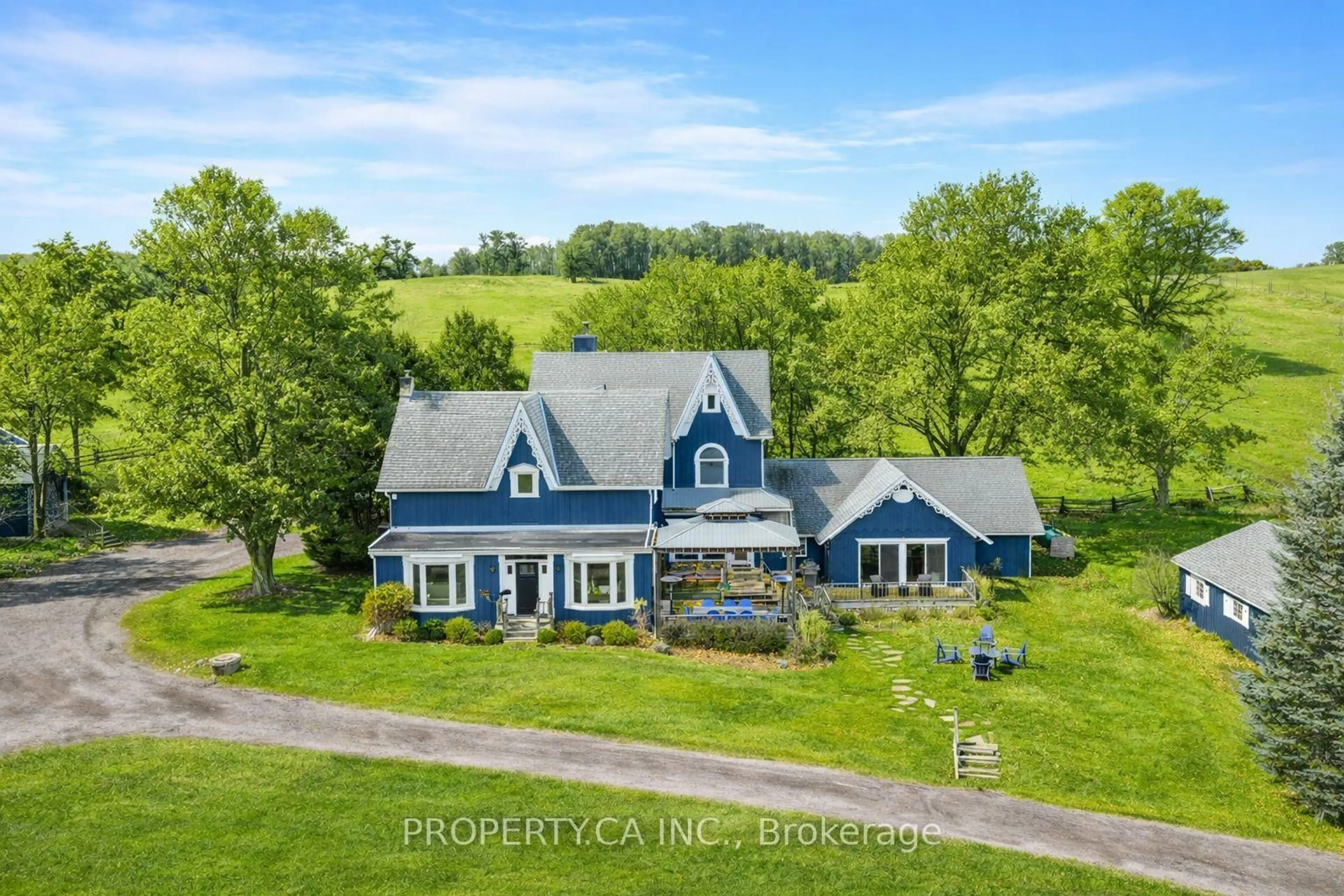 A pic from outside/outdoor area/front of a property/back of a property/a pic from drone, water/lake/river/ocean view for 876382 5th Line, Mulmur Ontario L9V 0J9