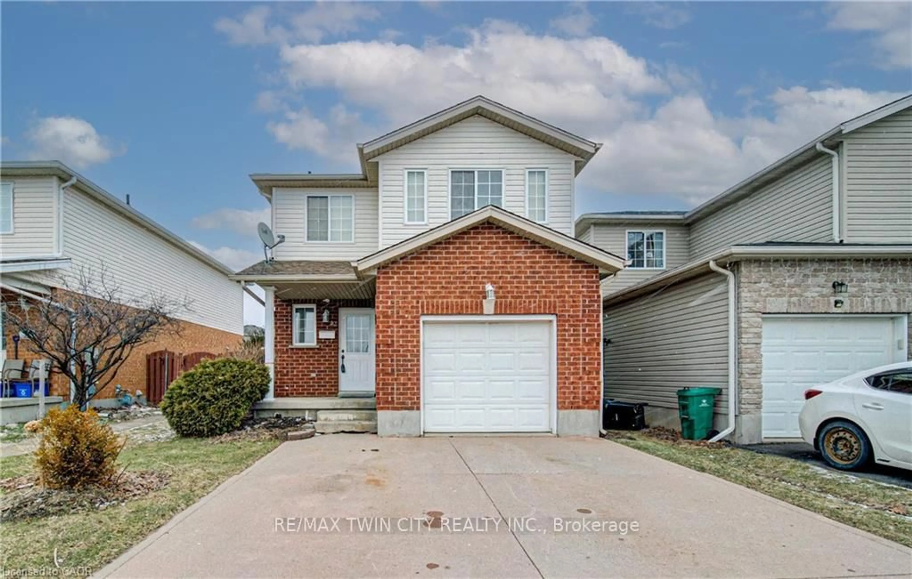 Home with brick exterior material, street for 93 EDGEMERE Dr, Cambridge Ontario N1P 1E9