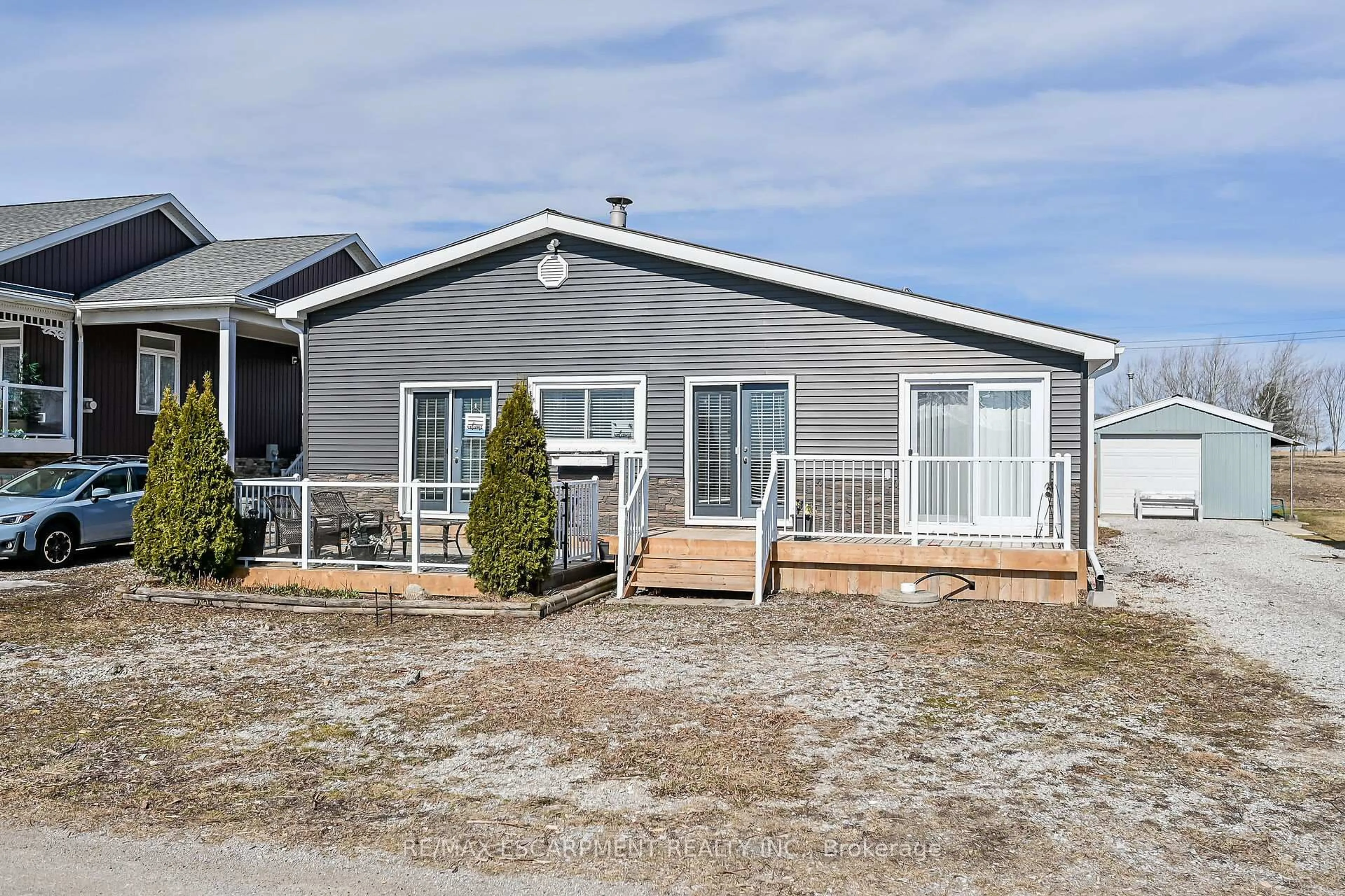 Home with vinyl exterior material, street for 87 Lakeshore Rd, Haldimand Ontario N0A 1P0