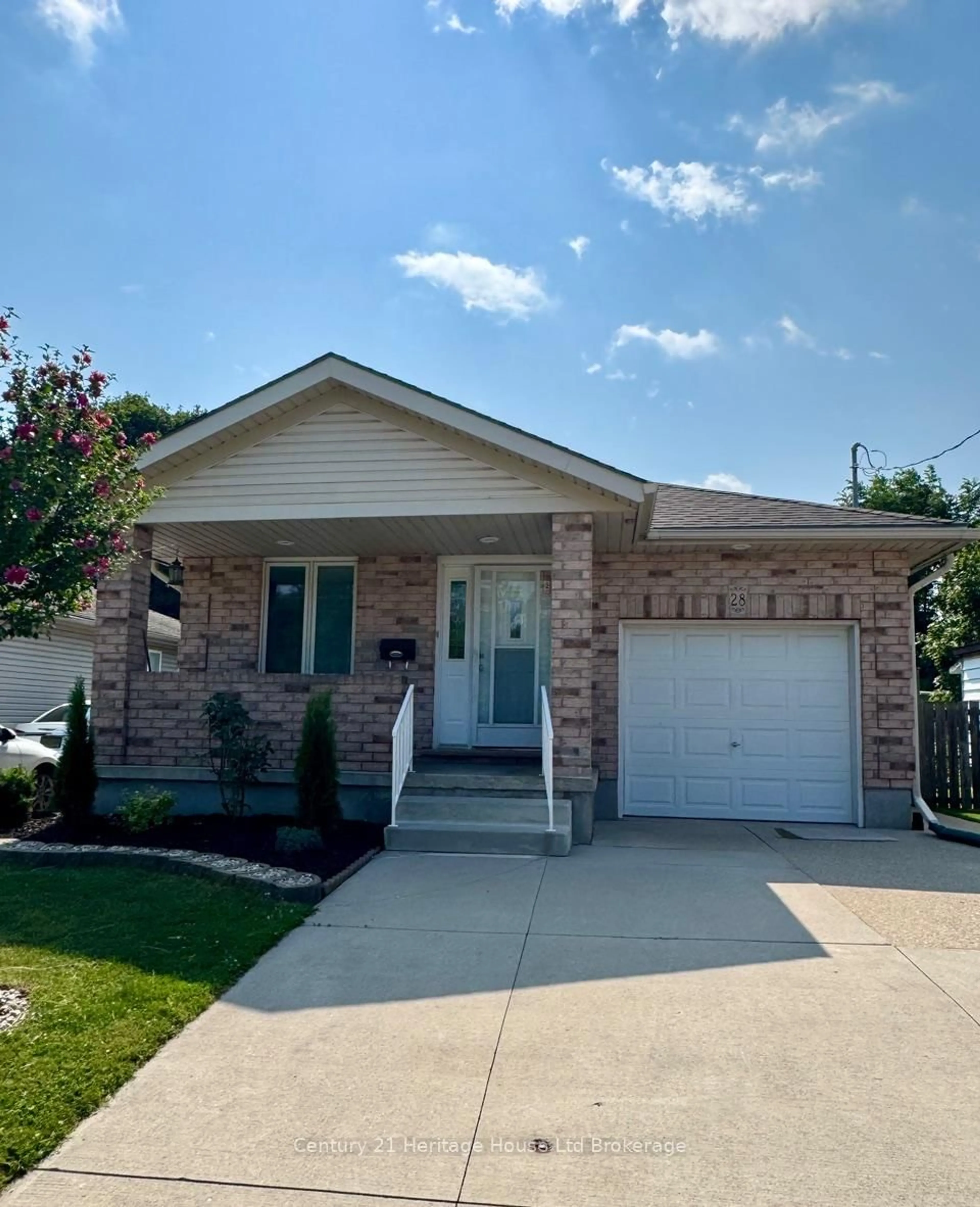 Home with brick exterior material, street for 28 Teeple St, Woodstock Ontario N4S 3Y7