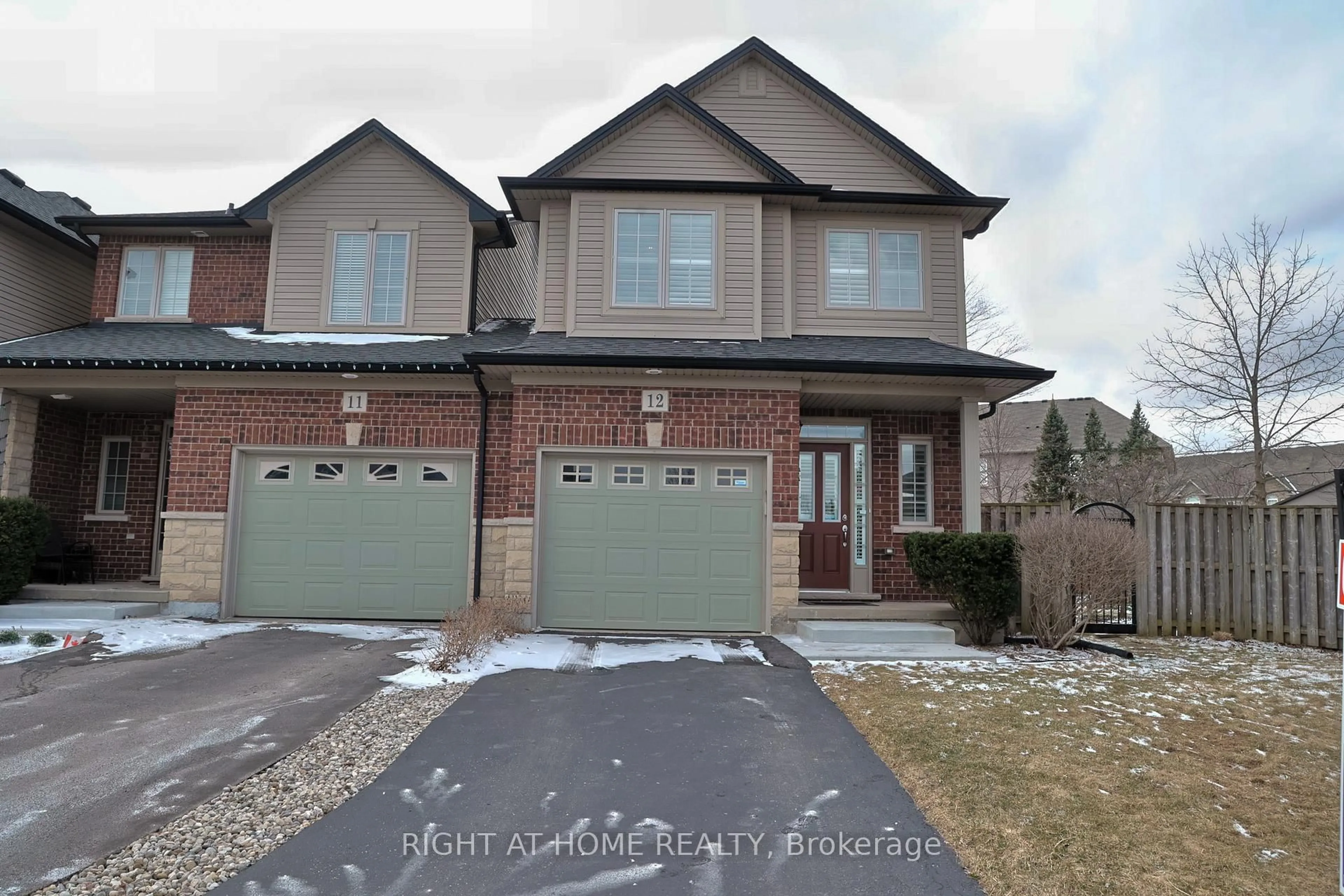 Home with brick exterior material, street for 400 Stonehenge Dr #12, Hamilton Ontario L9K 0A2