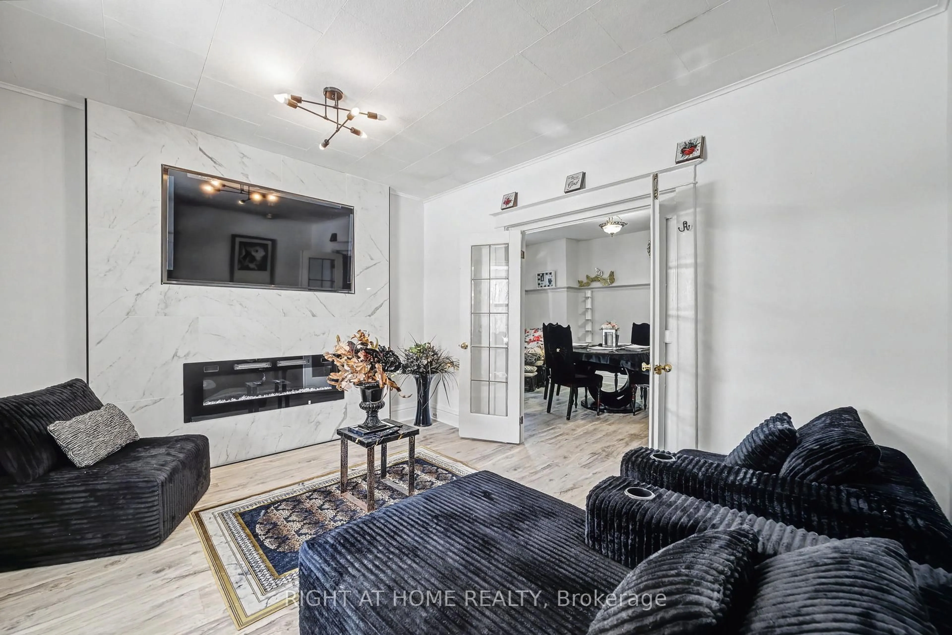 Living room with furniture, ceramic/tile floor for 36 Berryman Ave, St. Catharines Ontario L2R 3W9
