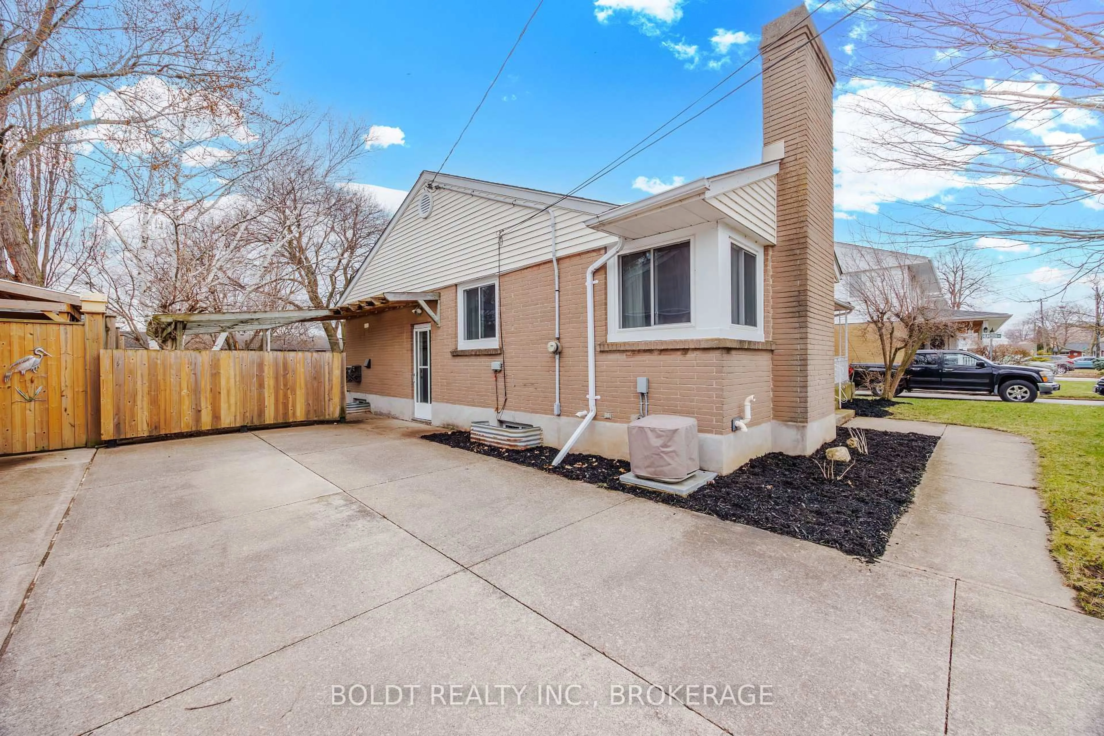 Home with brick exterior material, street for 12 Sunnyside Dr, St. Catharines Ontario L2M 2A1