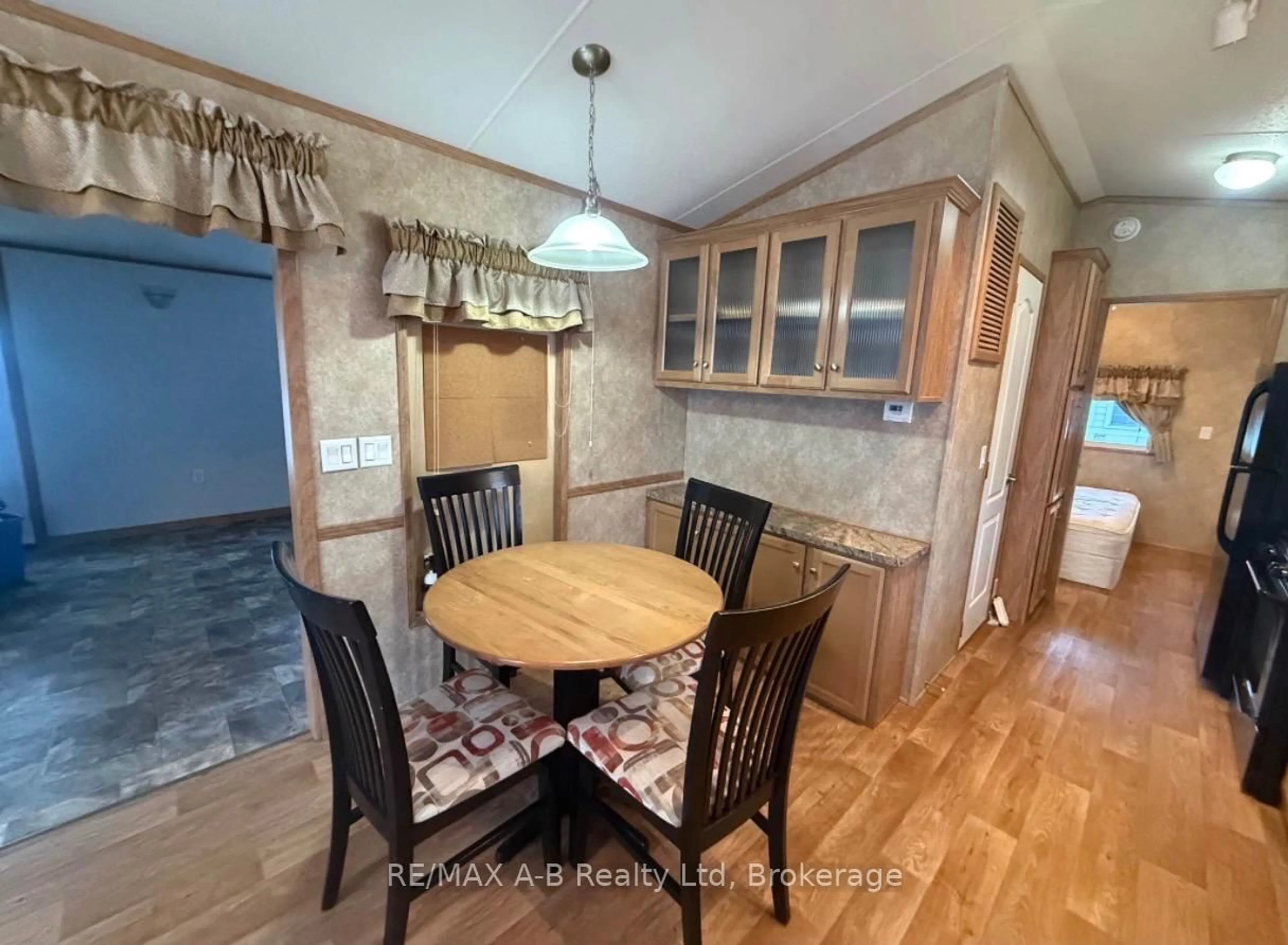 Dining room, wood/laminate floor for 923590 Road 92 Rd #405, Zorra Ontario N0J 1J0