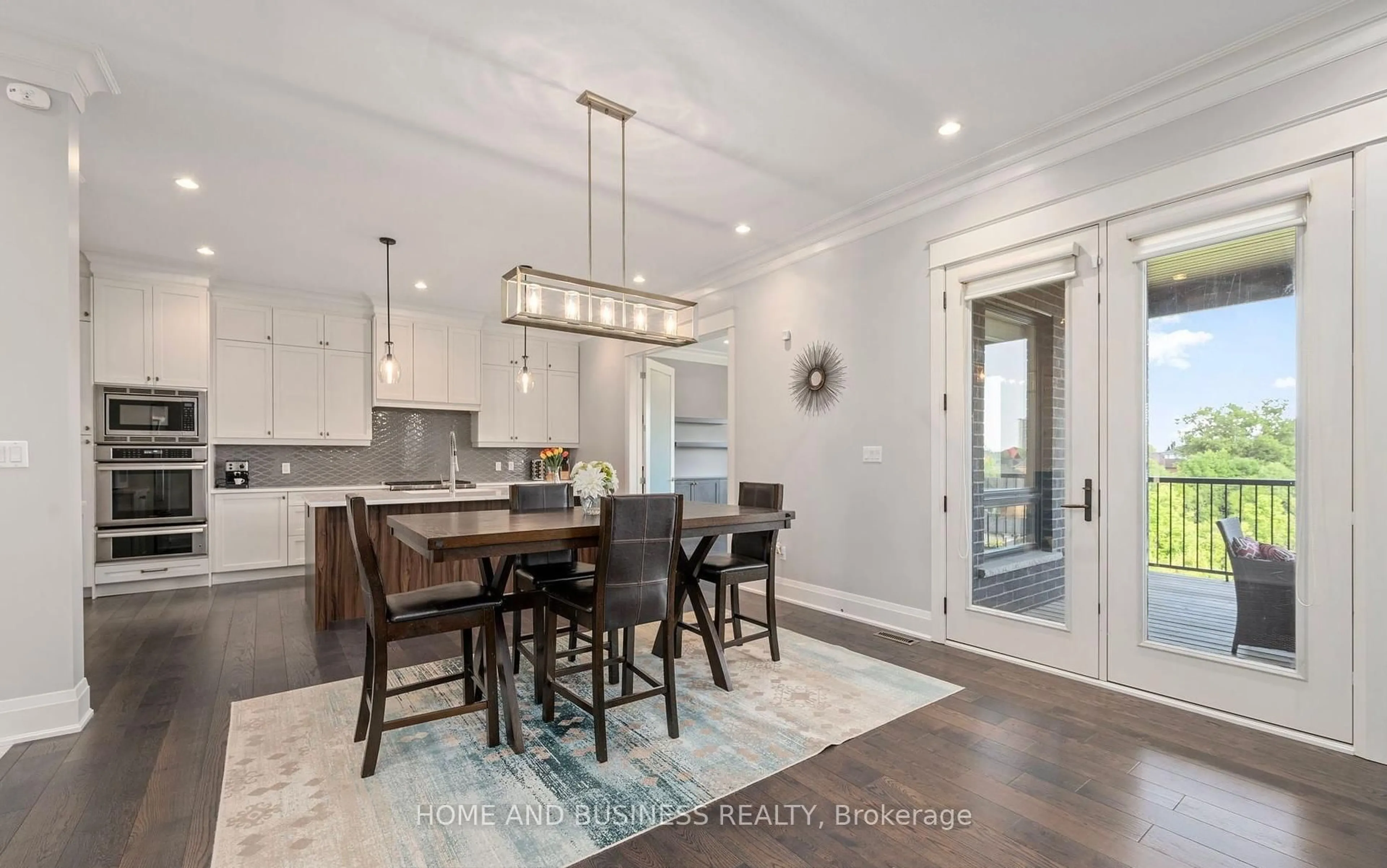 Open concept kitchen, wood/laminate floor for 1010 Longworth Rd, London South Ontario N6K 0C9