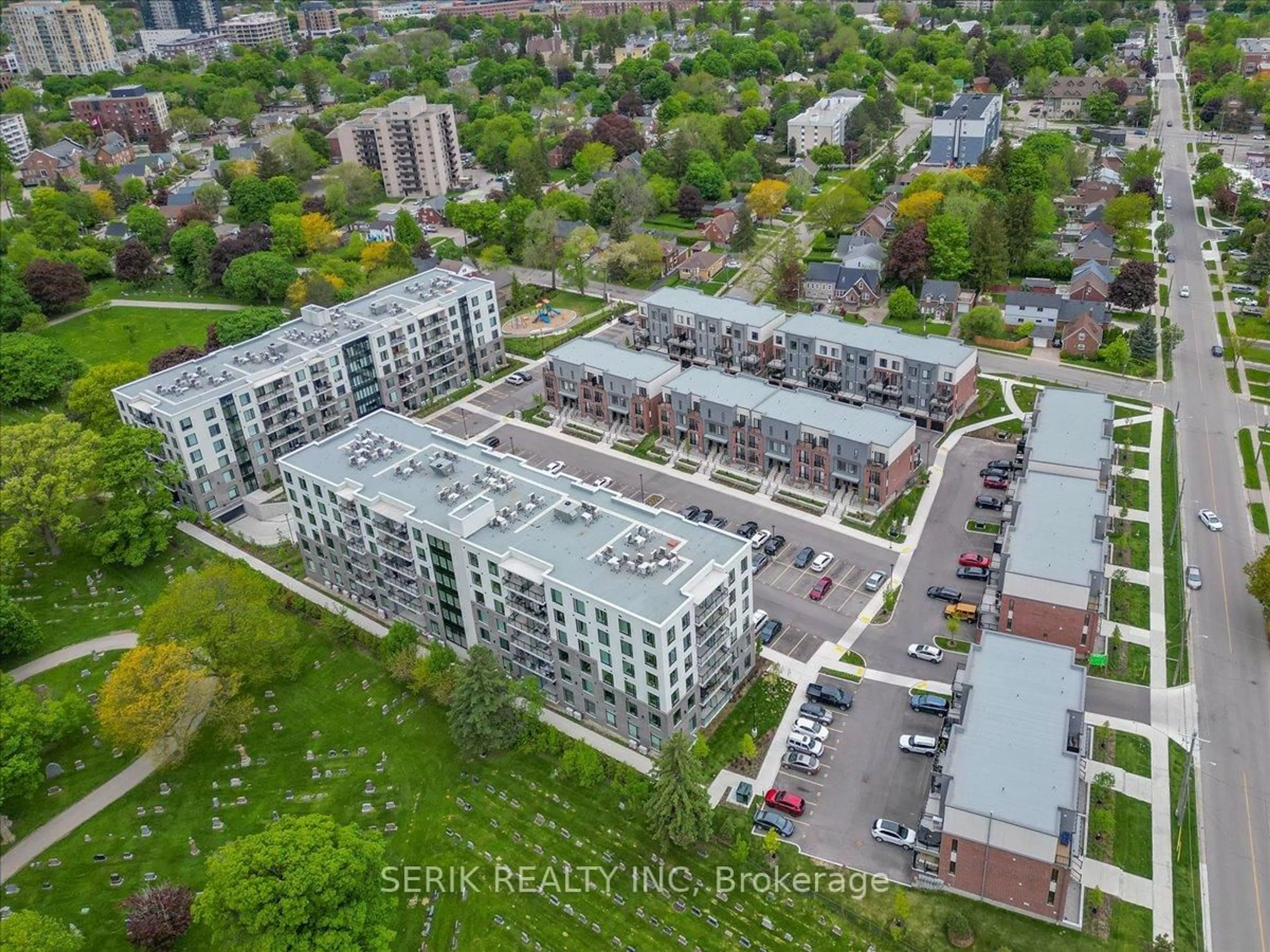 A pic from outside/outdoor area/front of a property/back of a property/a pic from drone, city buildings view from balcony for 99 Roger St #10, Waterloo Ontario N2J 1A4