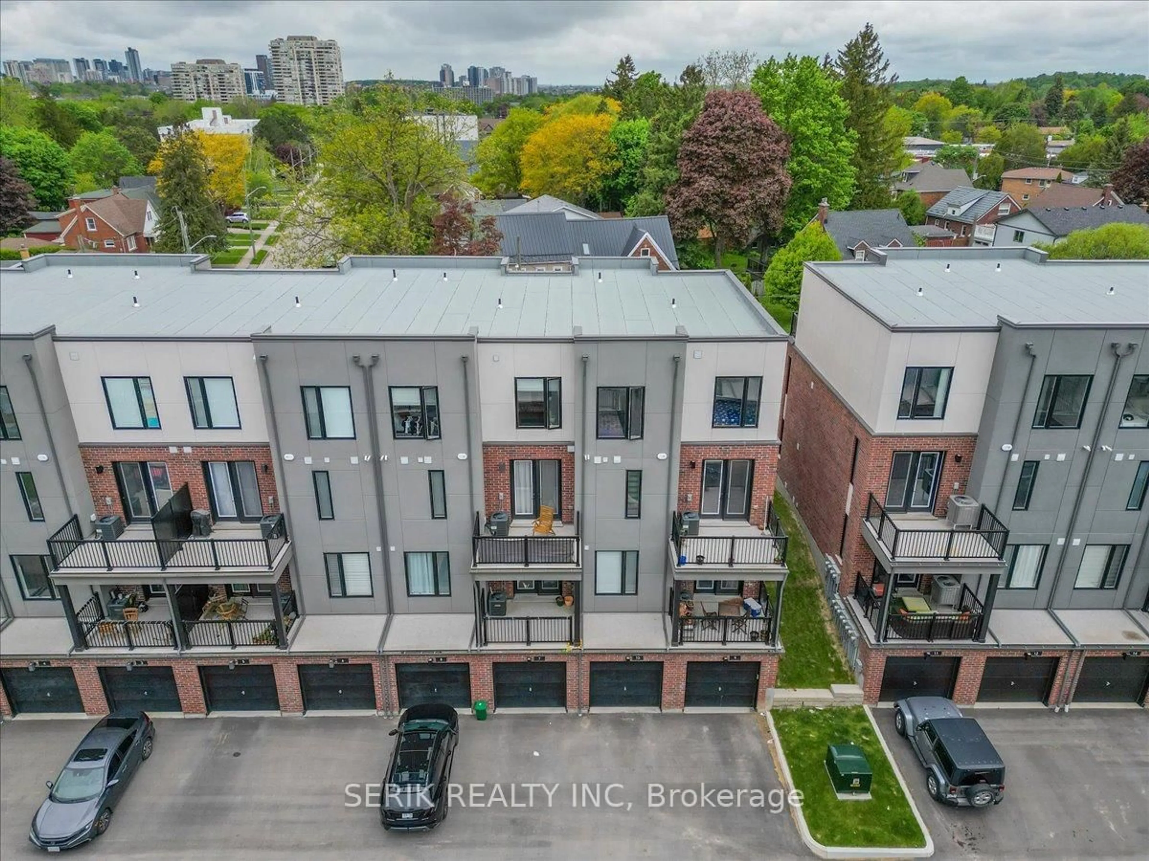 A pic from outside/outdoor area/front of a property/back of a property/a pic from drone, city buildings view from balcony for 99 Roger St #10, Waterloo Ontario N2J 1A4