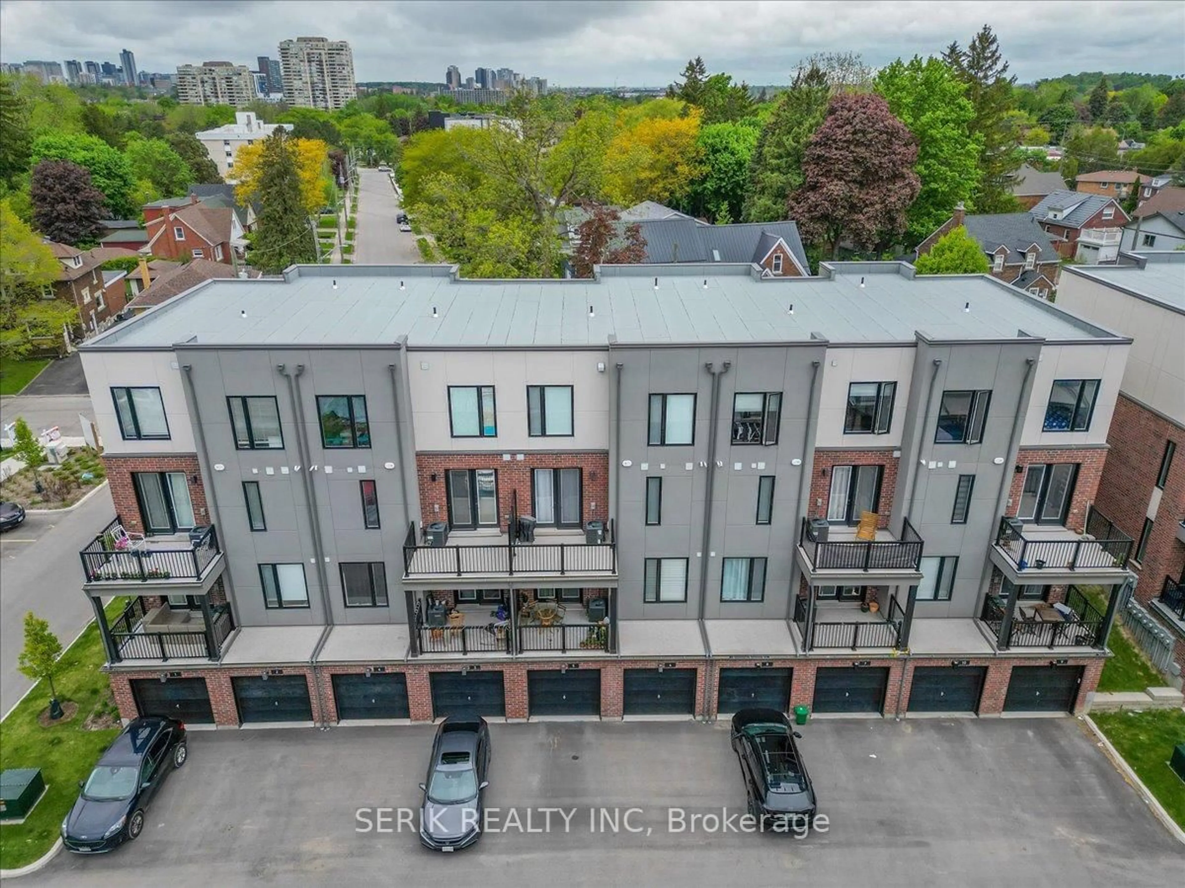 A pic from outside/outdoor area/front of a property/back of a property/a pic from drone, city buildings view from balcony for 99 Roger St #10, Waterloo Ontario N2J 1A4
