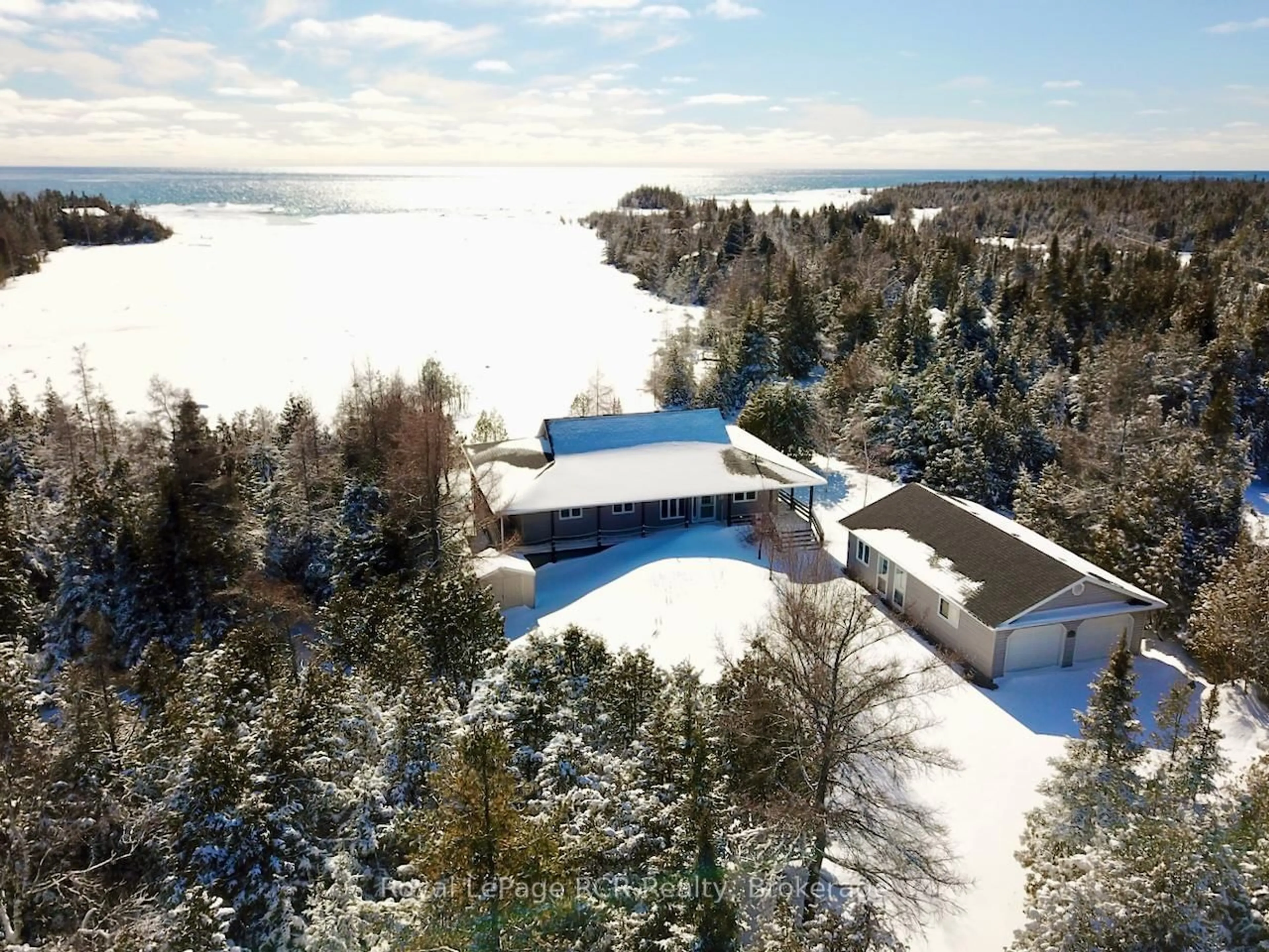 A pic from outside/outdoor area/front of a property/back of a property/a pic from drone, water/lake/river/ocean view for 34 HATT St, Northern Bruce Peninsula Ontario N0H 2R0