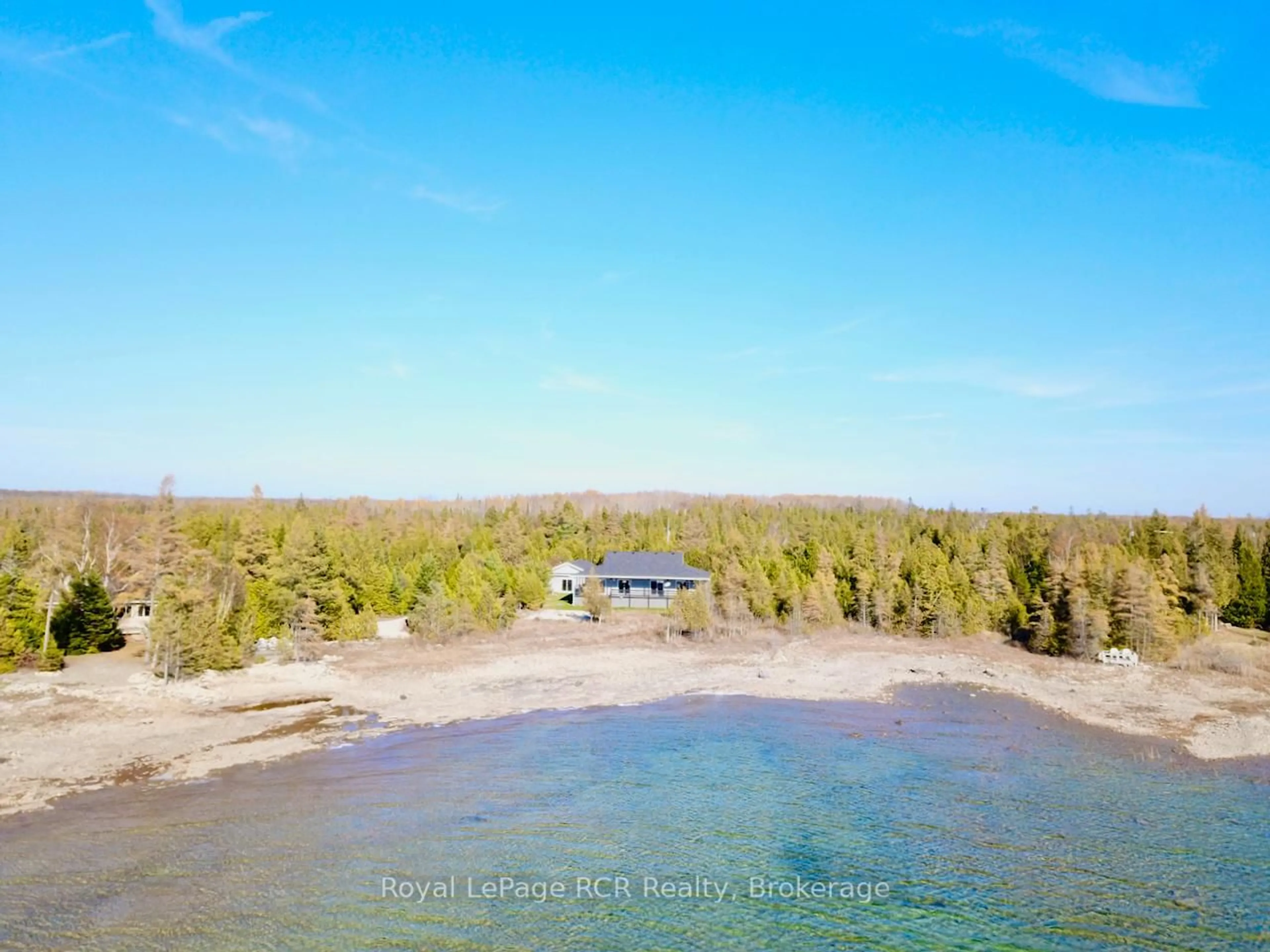 A pic from outside/outdoor area/front of a property/back of a property/a pic from drone, water/lake/river/ocean view for 34 HATT St, Northern Bruce Peninsula Ontario N0H 2R0