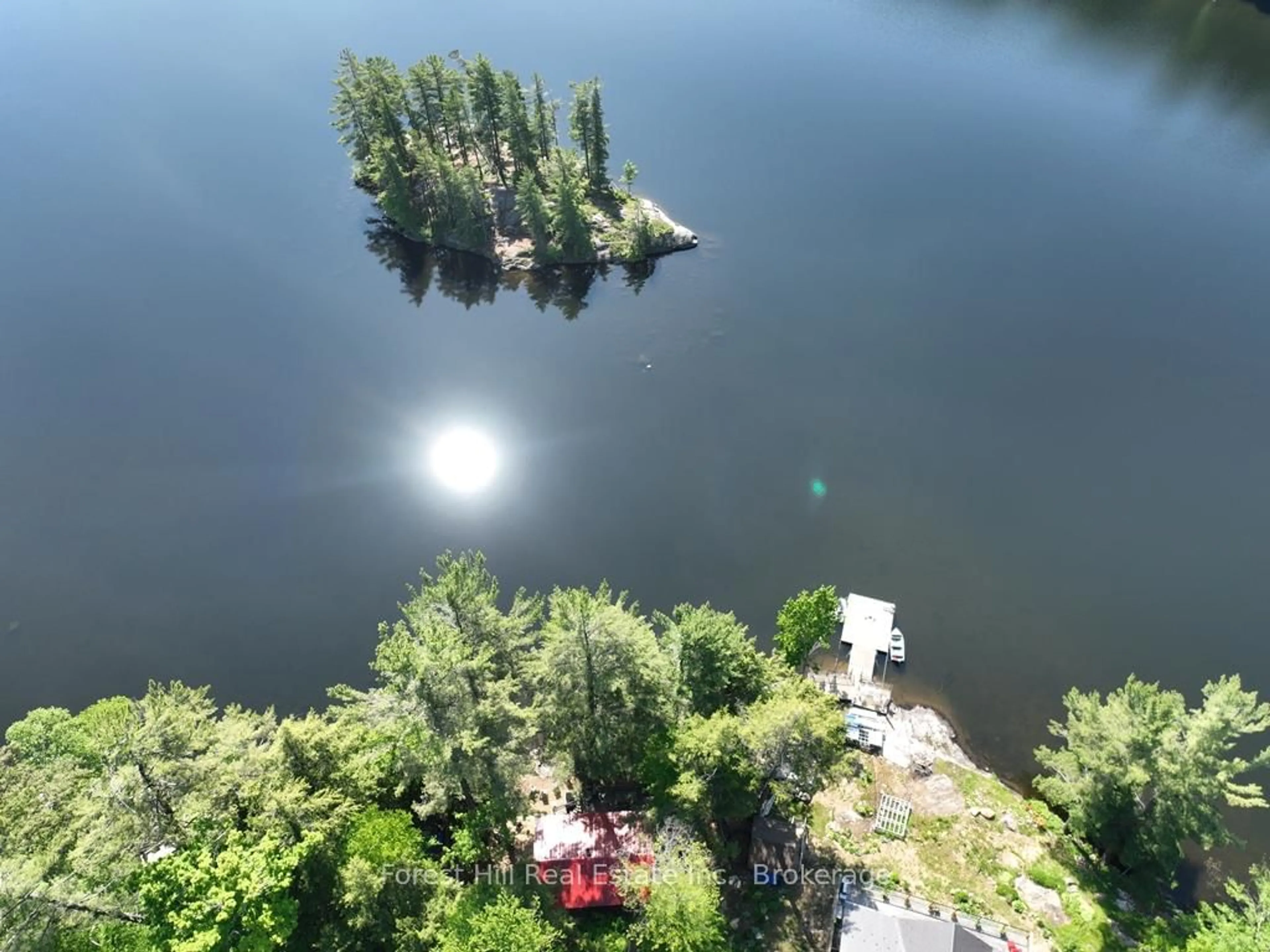 A pic from outside/outdoor area/front of a property/back of a property/a pic from drone, water/lake/river/ocean view for 1293 Causeway Dr, Algonquin Highlands Ontario P0A 1E0