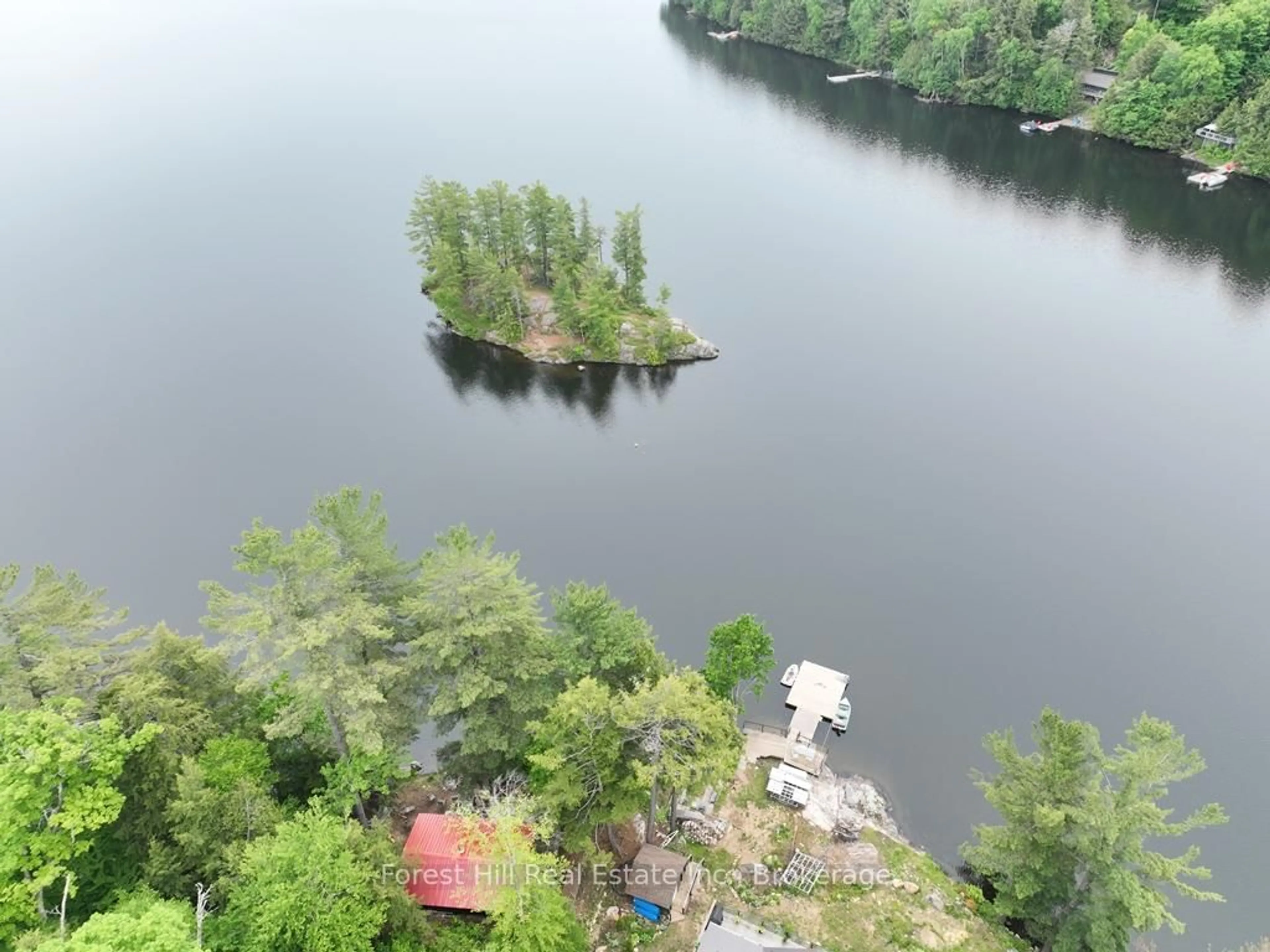 A pic from outside/outdoor area/front of a property/back of a property/a pic from drone, water/lake/river/ocean view for 1293 Causeway Dr, Algonquin Highlands Ontario P0A 1E0