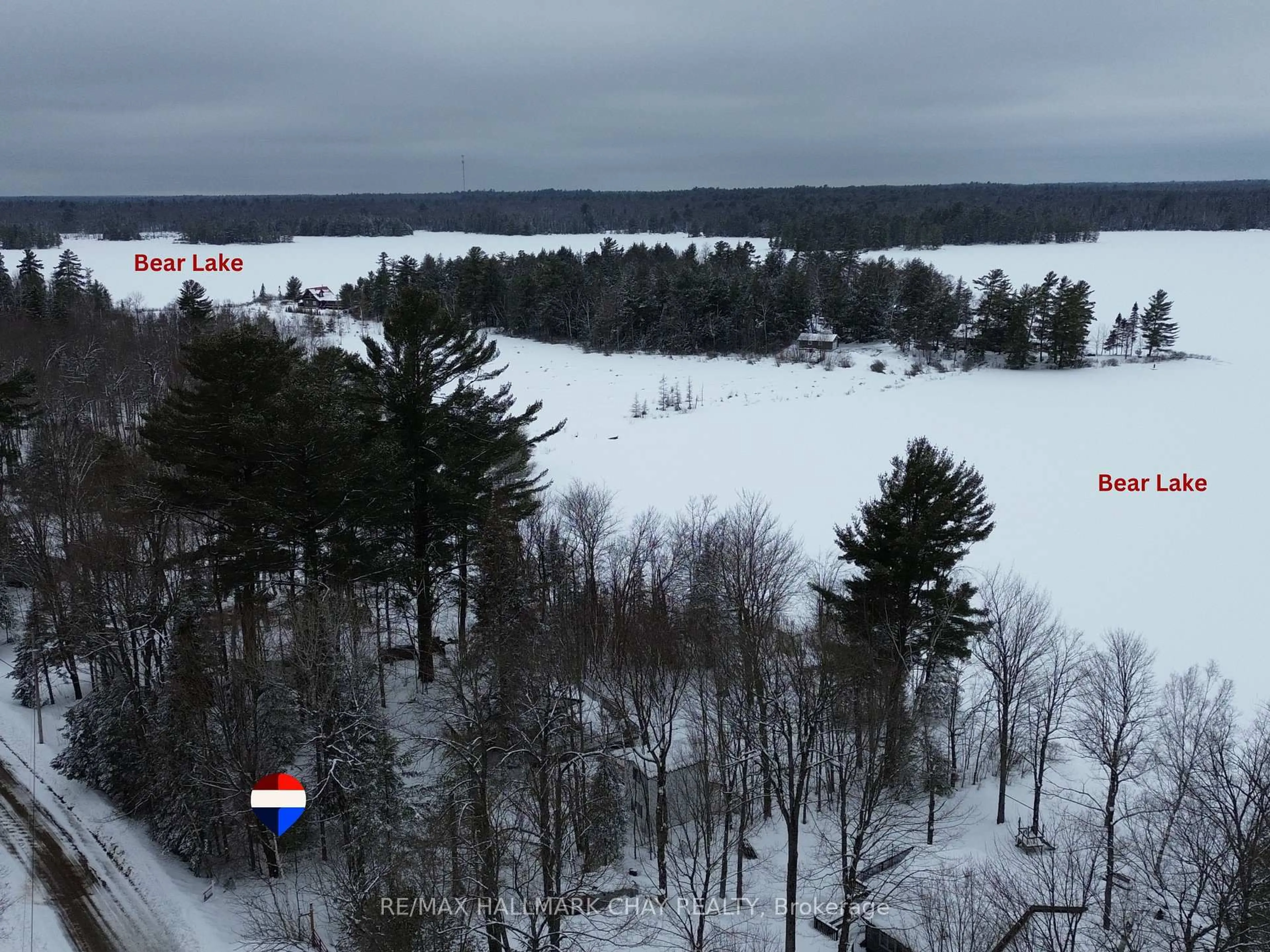 A pic from outside/outdoor area/front of a property/back of a property/a pic from drone, forest/trees view for 51 Bayside Dr, McMurrich/Monteith Ontario P0A 1Y0