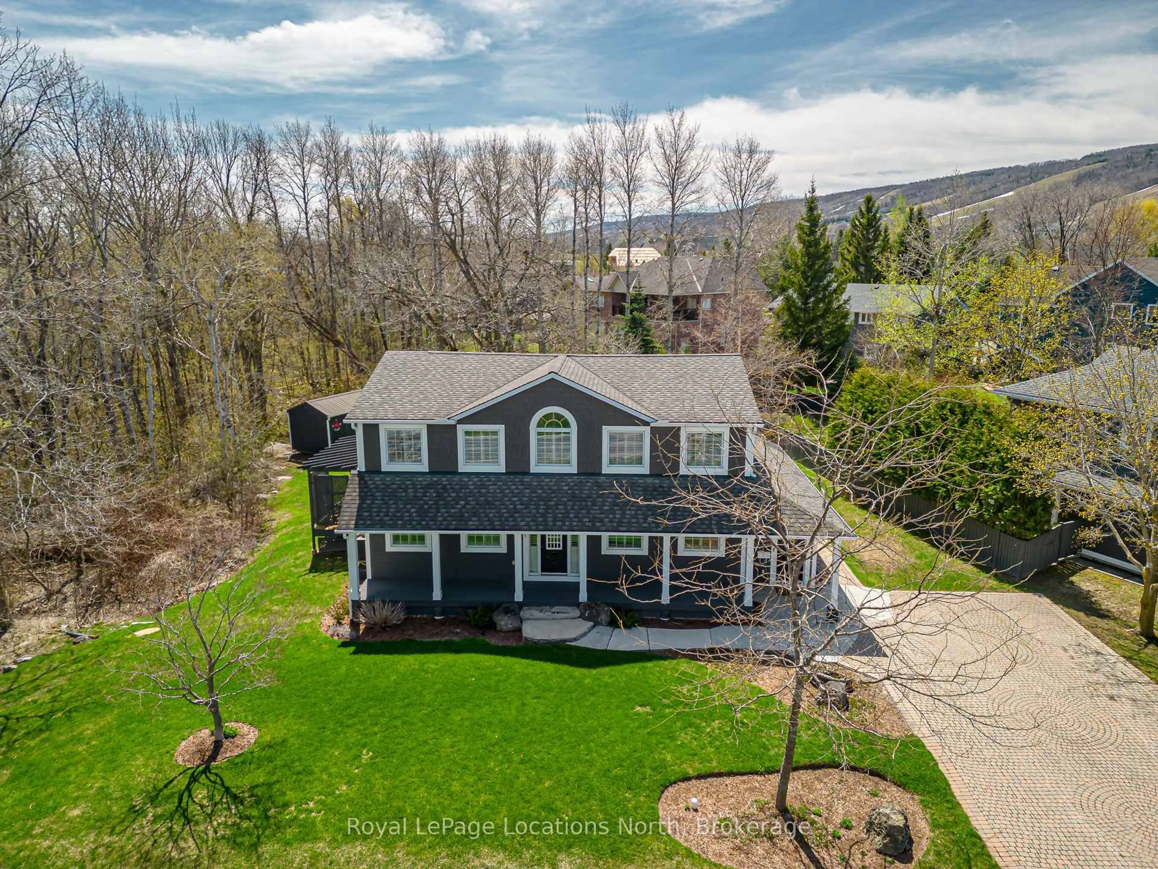 A pic from outside/outdoor area/front of a property/back of a property/a pic from drone, mountain view for 110 Liisa's Lane, Blue Mountains Ontario L9Y 0M3