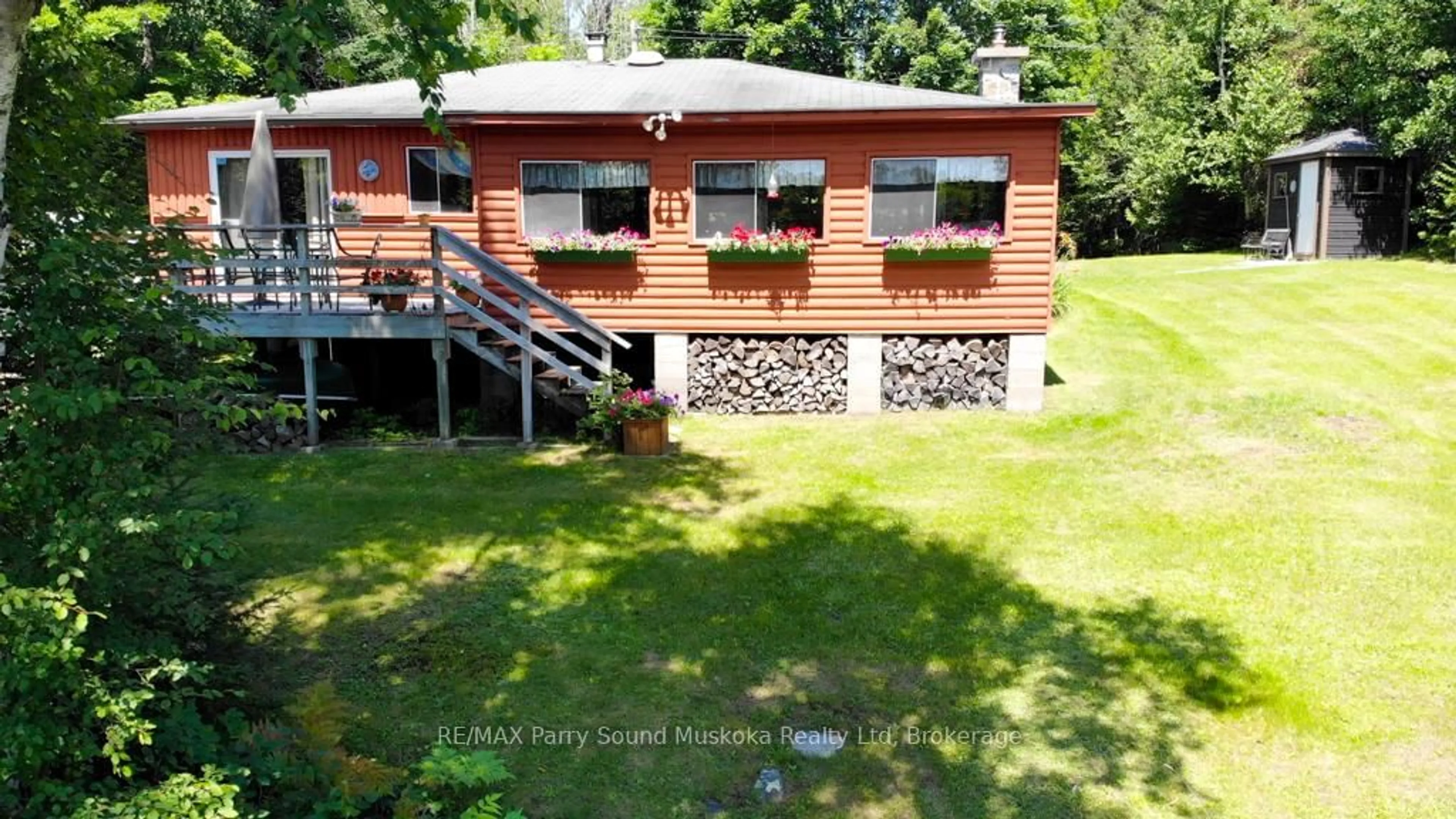 A pic from outside/outdoor area/front of a property/back of a property/a pic from drone, water/lake/river/ocean view for 20 GOLDEN HORSESHOE Lane, Whitestone Ontario P0A 1G0