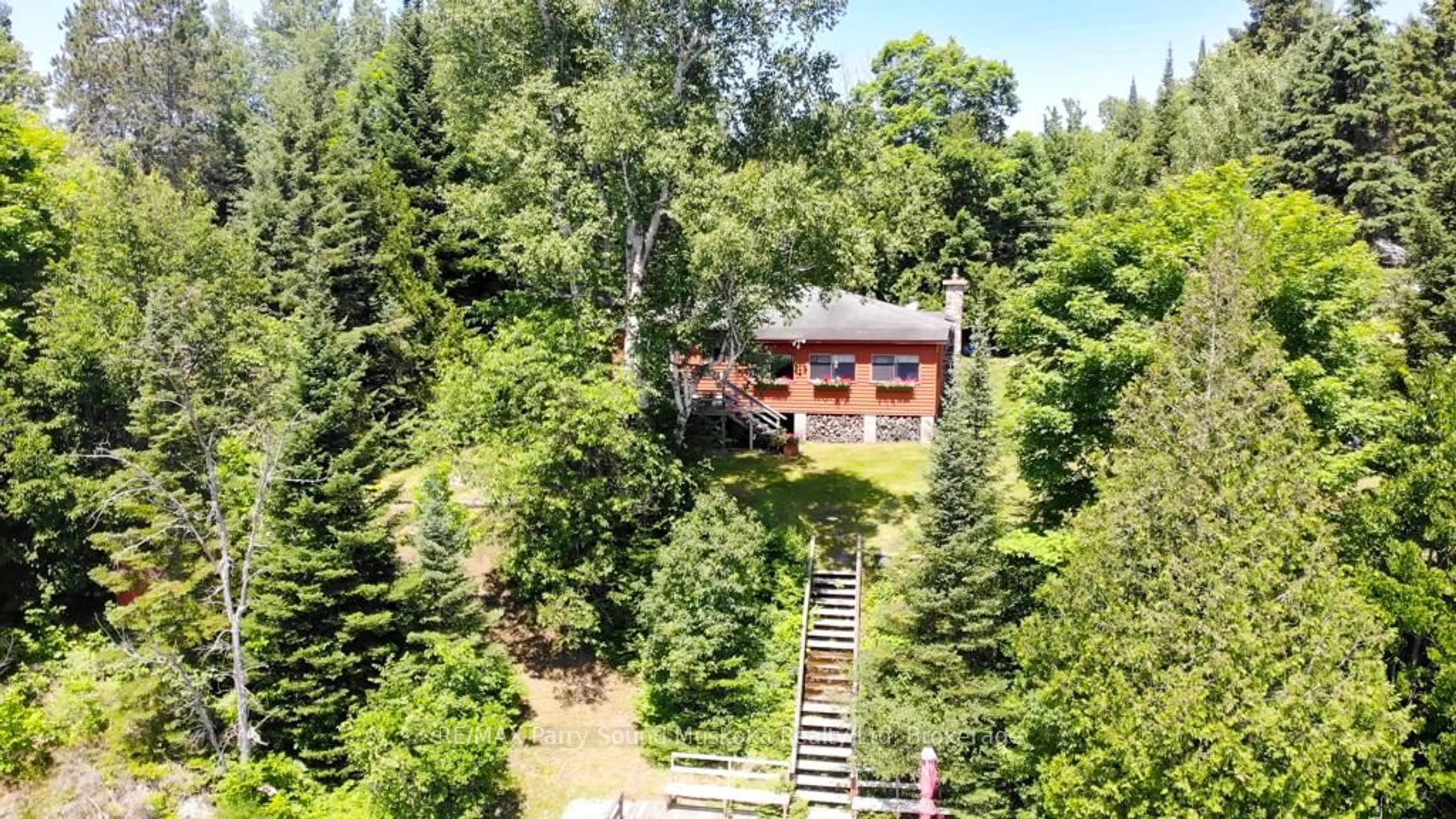 A pic from outside/outdoor area/front of a property/back of a property/a pic from drone, forest/trees view for 20 GOLDEN HORSESHOE Lane, Whitestone Ontario P0A 1G0