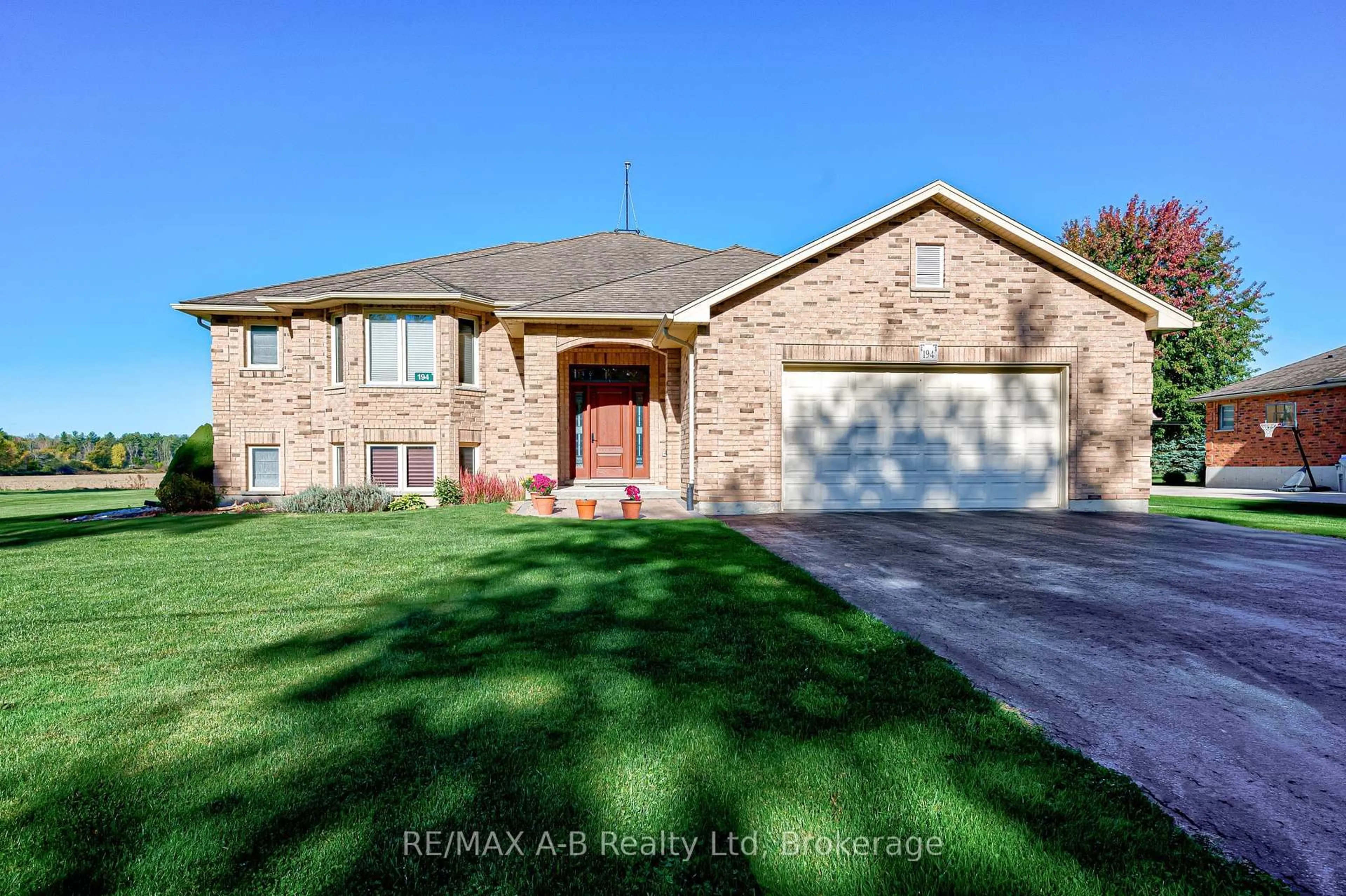 Home with brick exterior material, street for 194 Station Rd, Perth South Ontario N0K 1X0