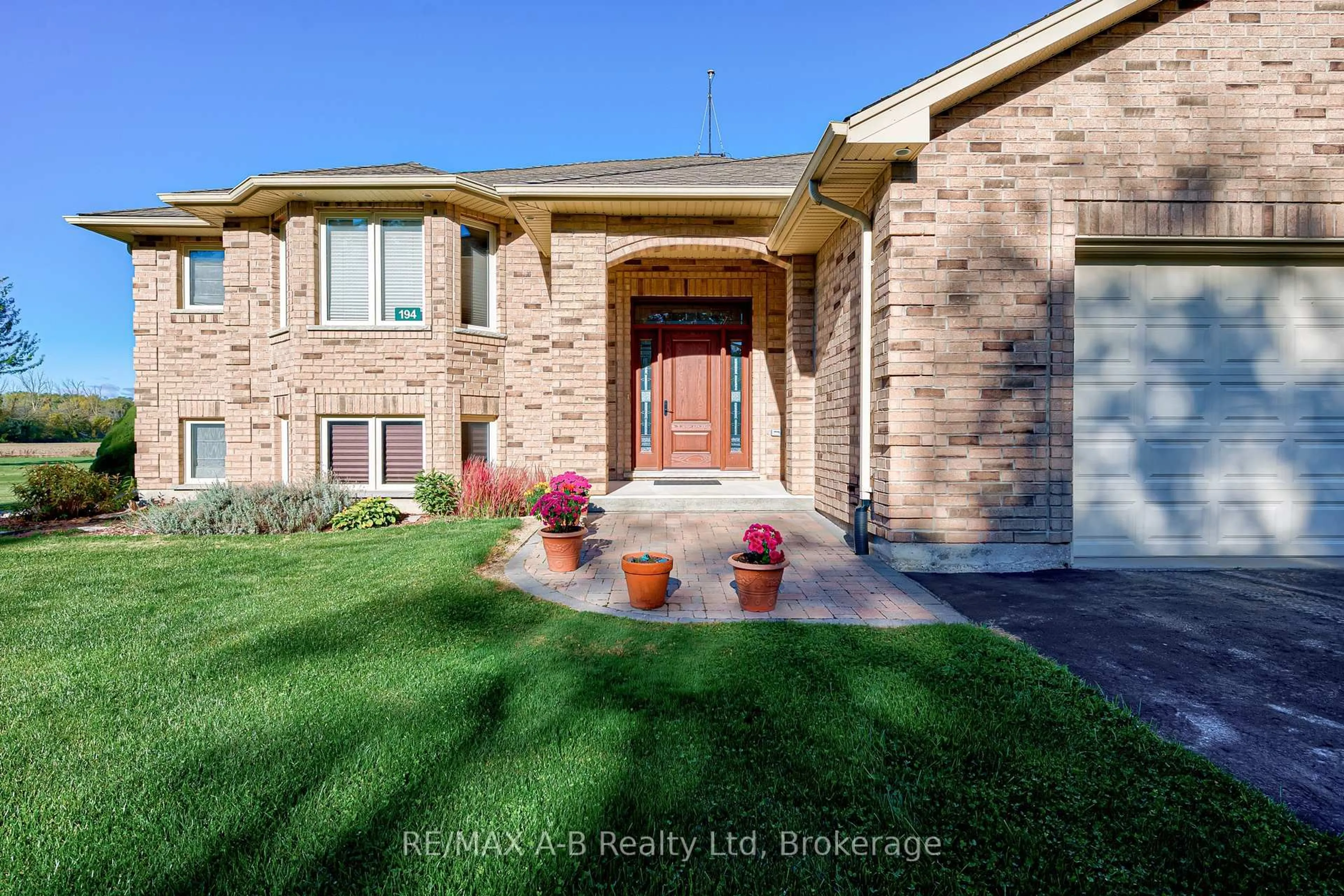 Home with brick exterior material, street for 194 Station Rd, Perth South Ontario N0K 1X0