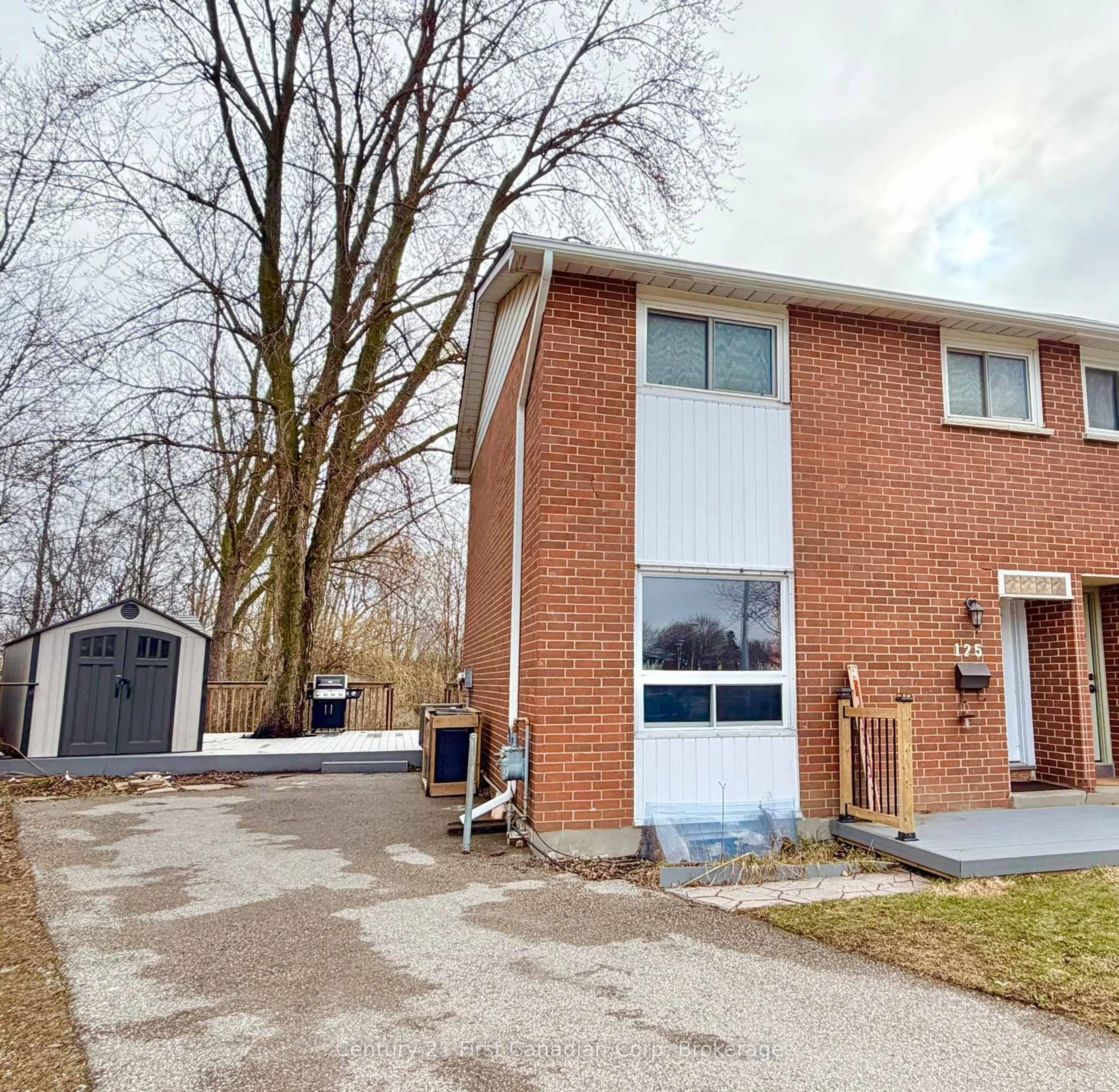 Home with brick exterior material, street for 125 KEATS Dr, Woodstock Ontario N5C 8C1