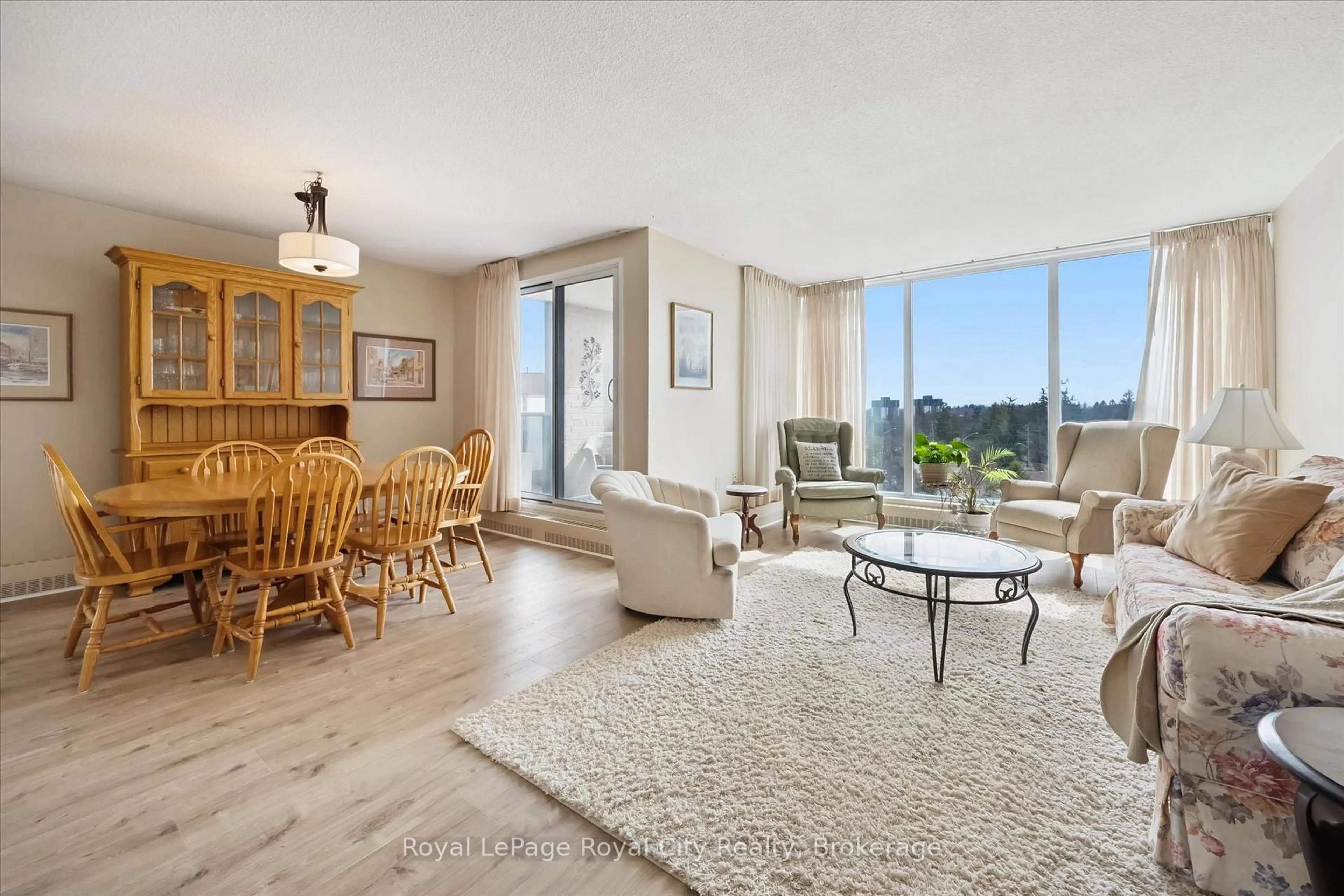 Living room with furniture, unknown for 19 Woodlawn Rd #703, Guelph Ontario N1H 7B1