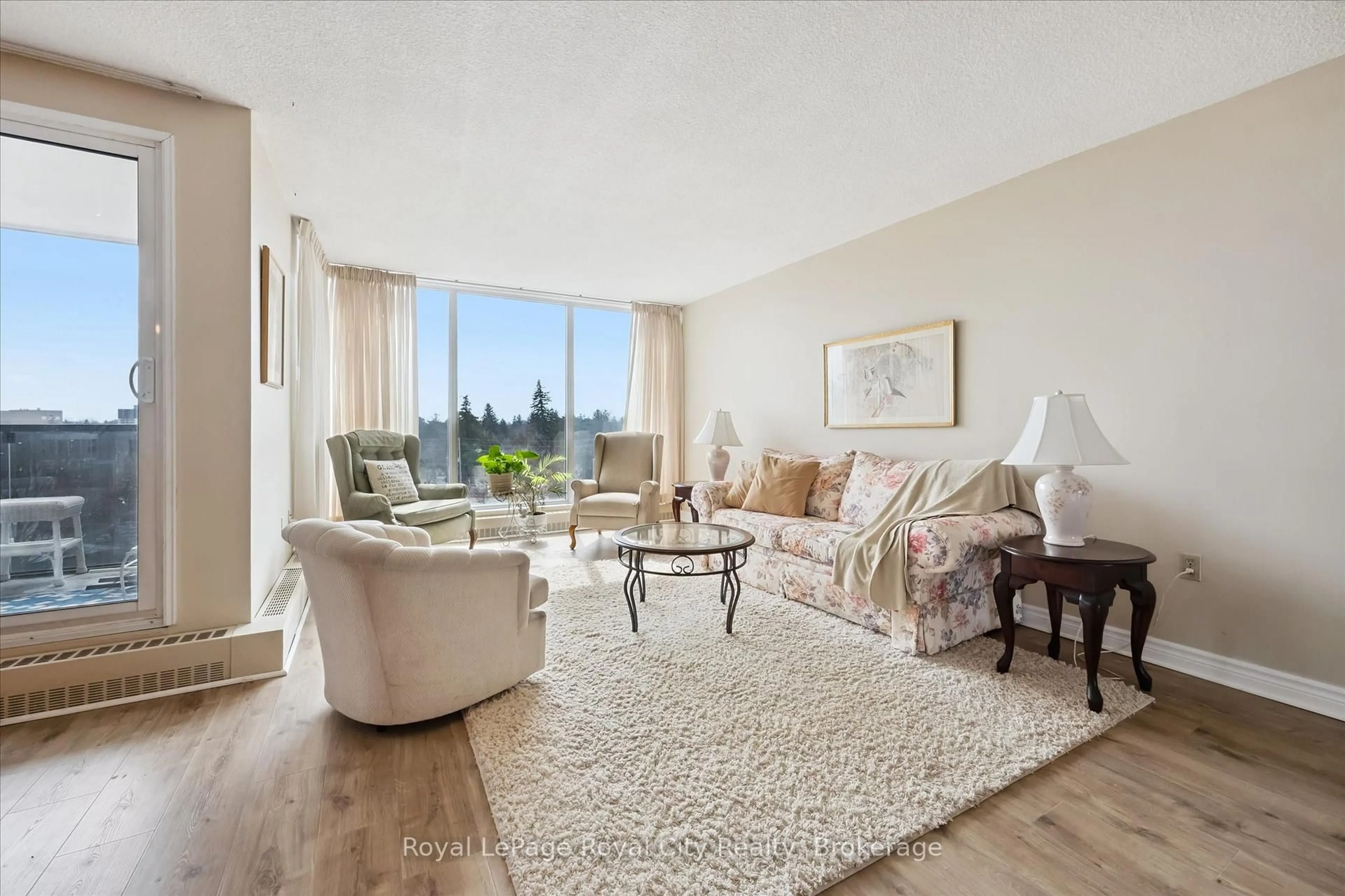 Living room with furniture, unknown for 19 Woodlawn Rd #703, Guelph Ontario N1H 7B1