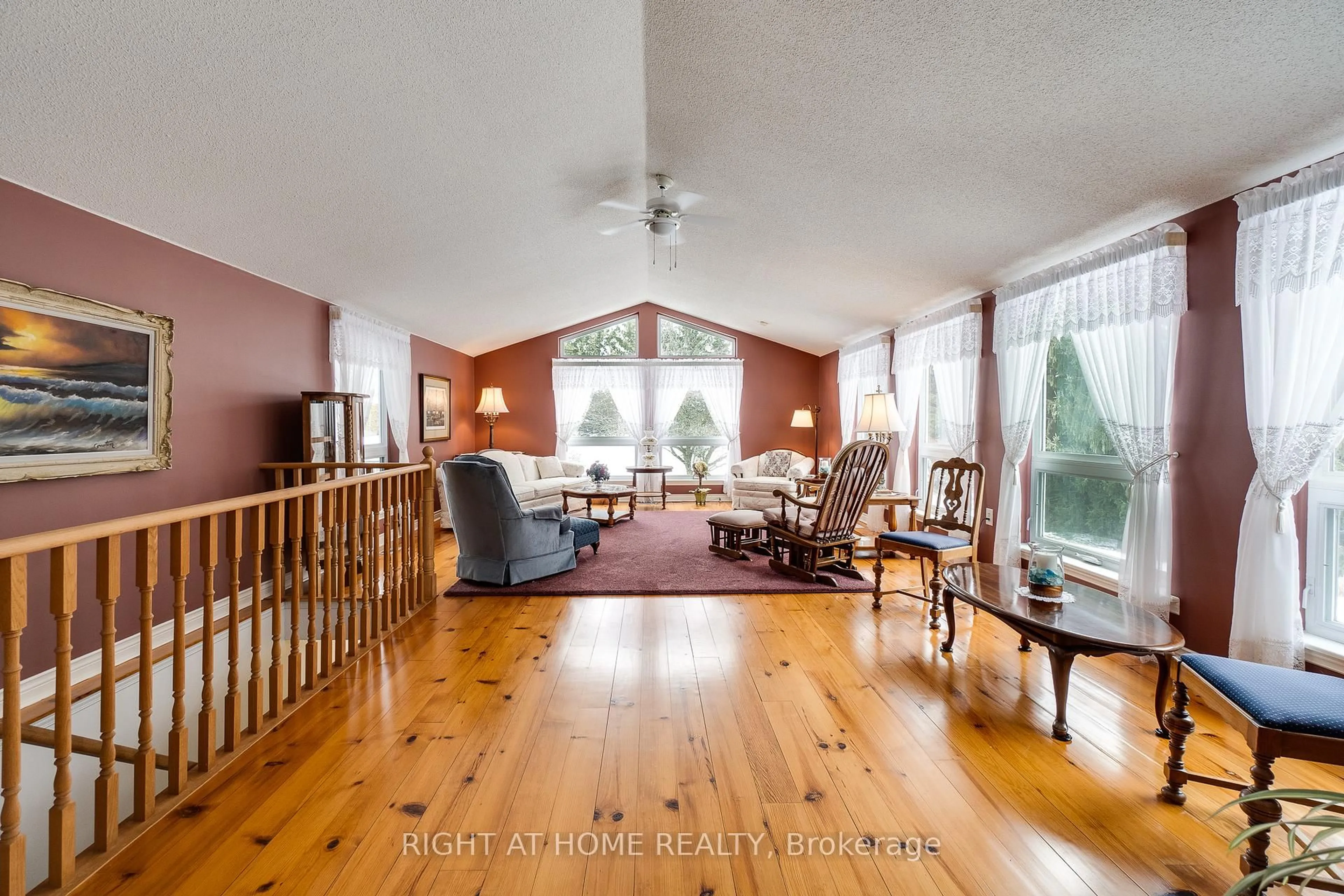 Living room with furniture, wood/laminate floor for 9632 County 10 Rd, Port Hope Ontario L0A 1B0