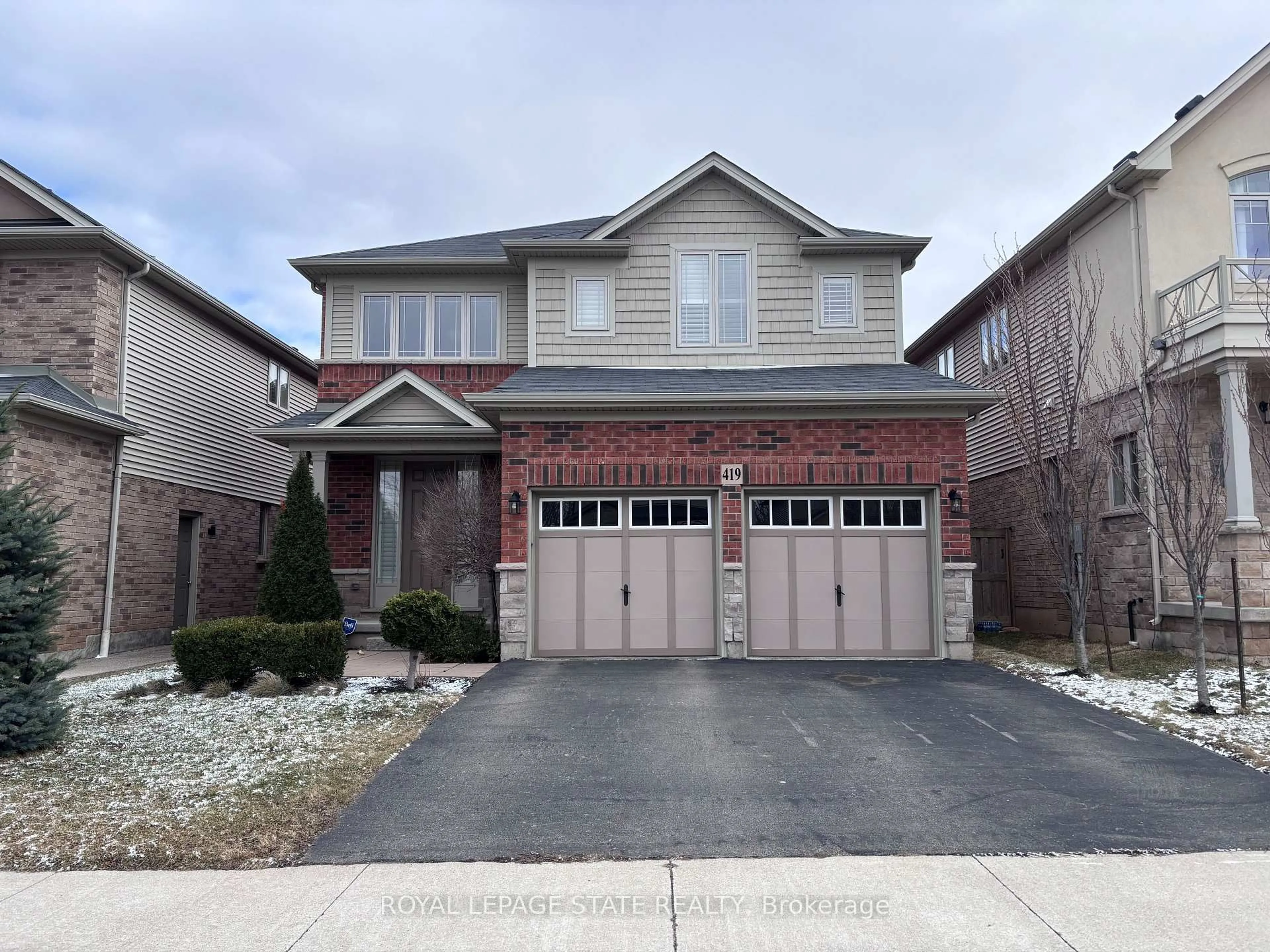 Home with brick exterior material, street for 419 Macintosh Dr, Hamilton Ontario L8E 0H9
