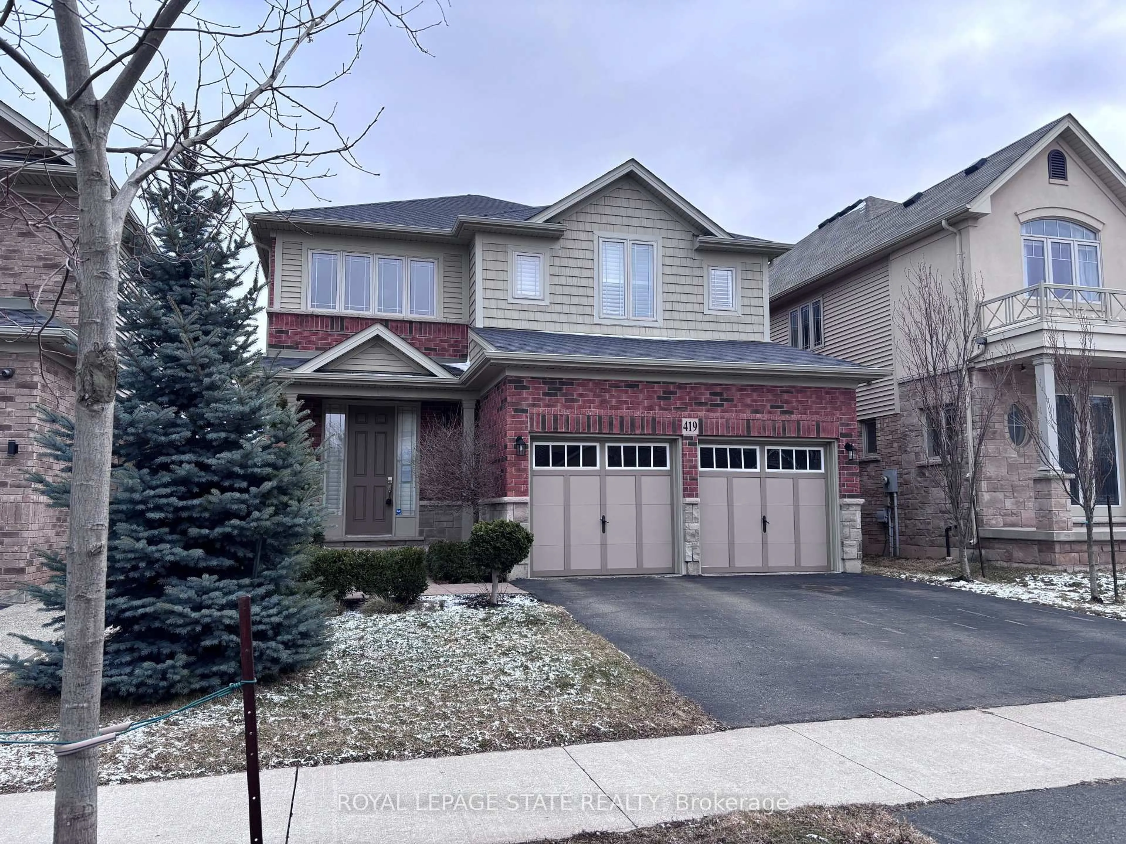 Home with brick exterior material, street for 419 Macintosh Dr, Hamilton Ontario L8E 0H9
