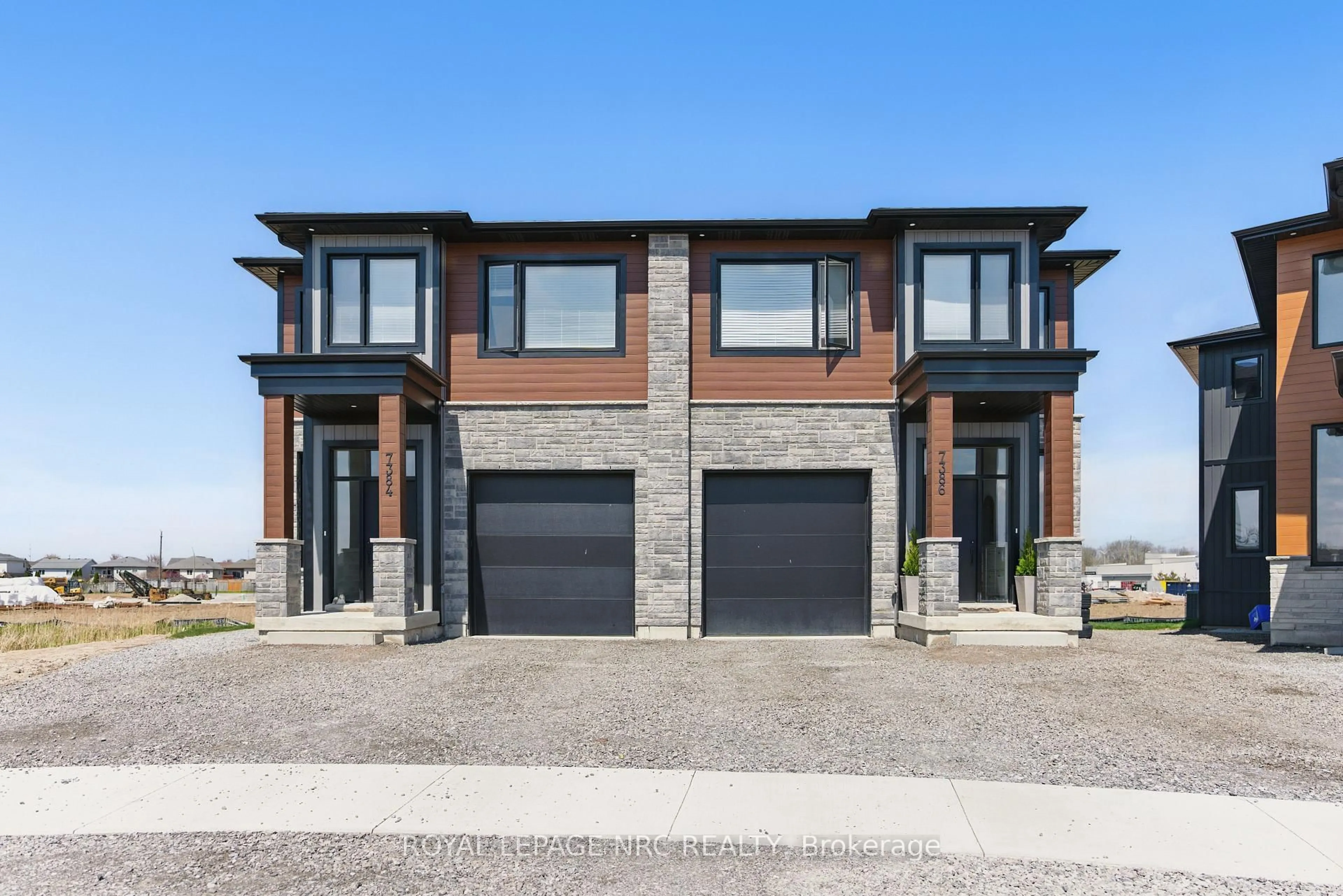 Home with brick exterior material, street for 7386 Splendour Dr, Niagara Falls Ontario L2H 3V8