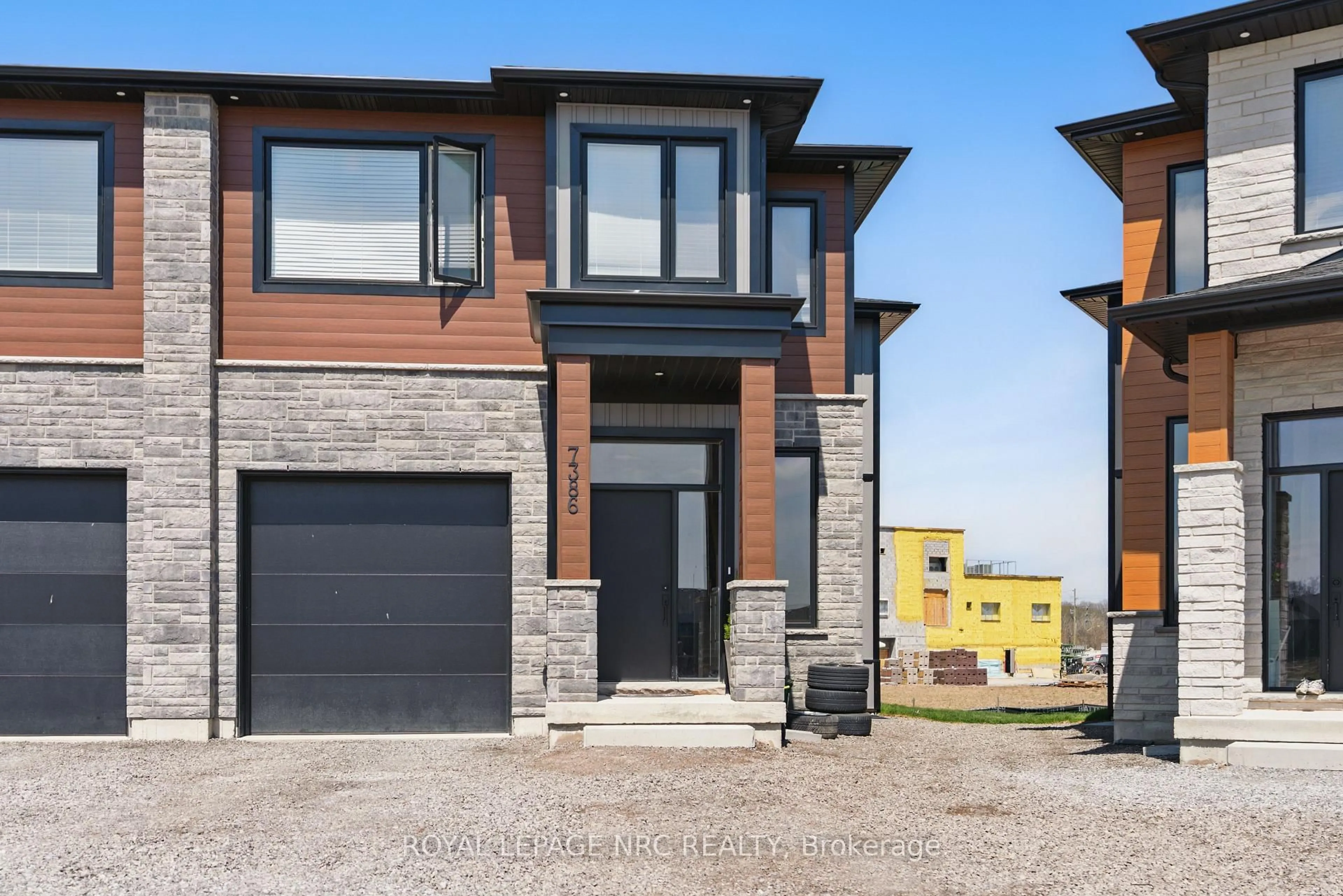 Home with brick exterior material, street for 7386 Splendour Dr, Niagara Falls Ontario L2H 3V8