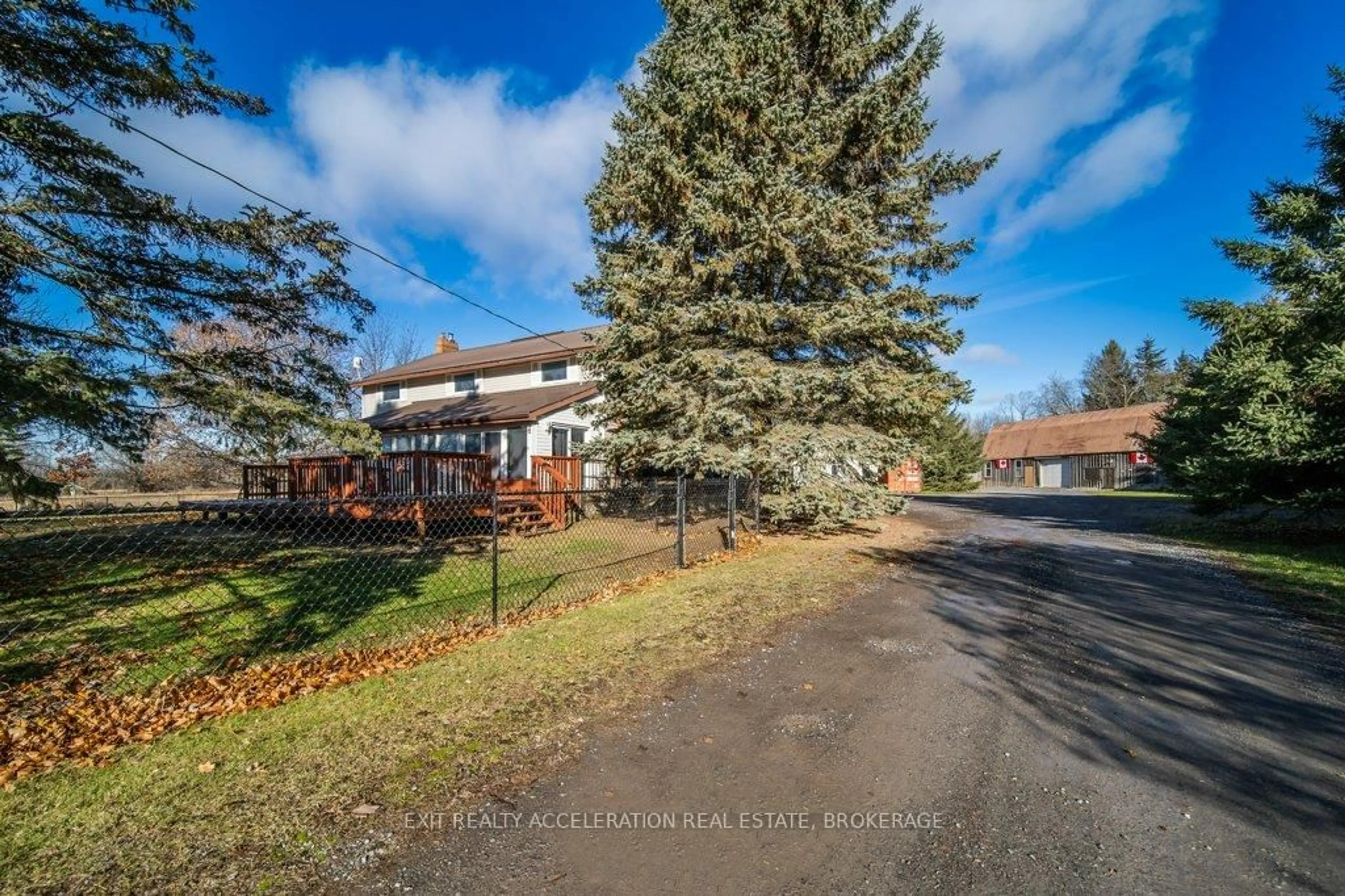A pic from outside/outdoor area/front of a property/back of a property/a pic from drone, street for 8061 County Rd 2, Greater Napanee Ontario K0K 2W0