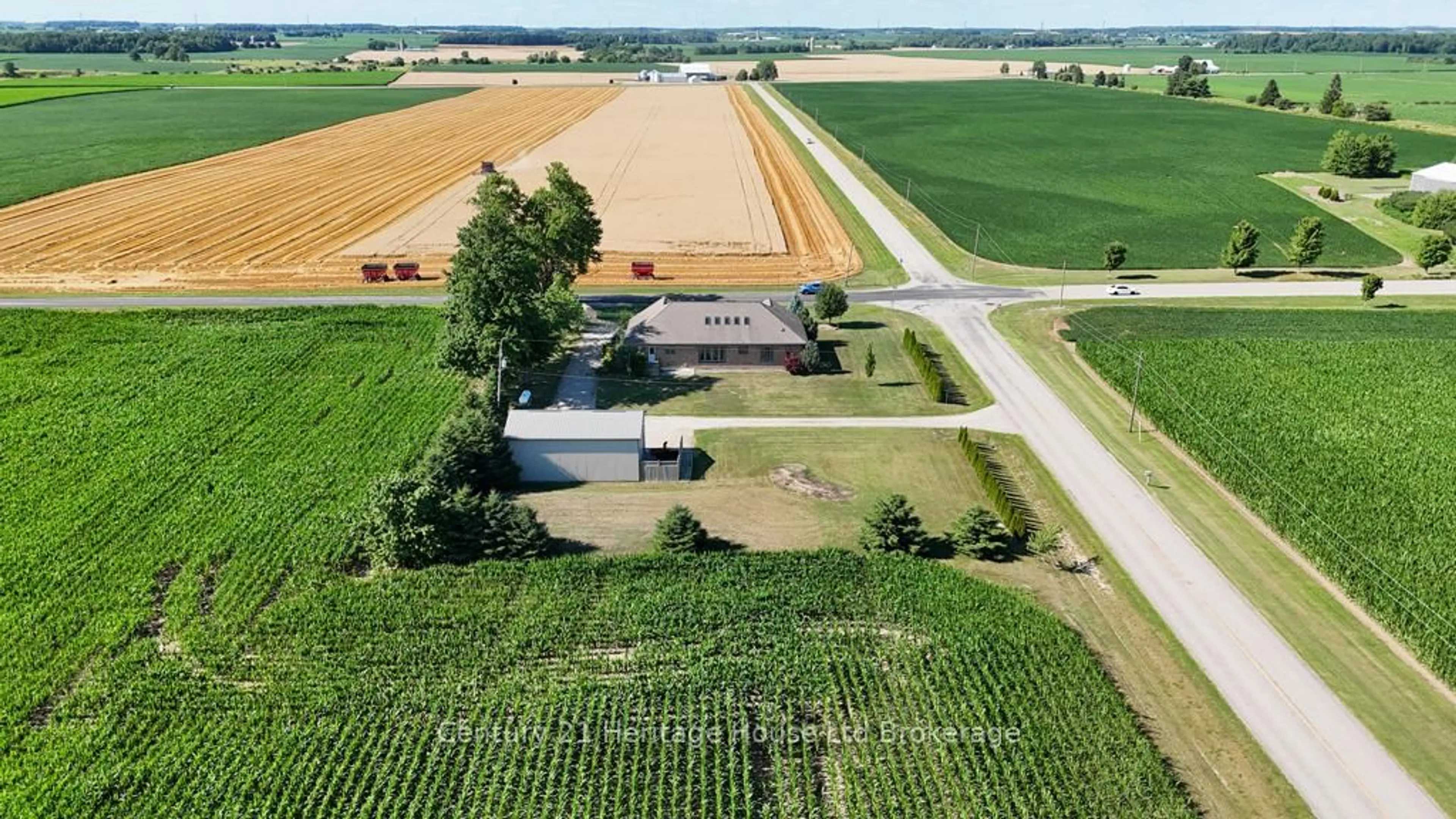 A pic from outside/outdoor area/front of a property/back of a property/a pic from drone, street for 11069 Rogers Rd, Malahide Ontario N5H 2R6