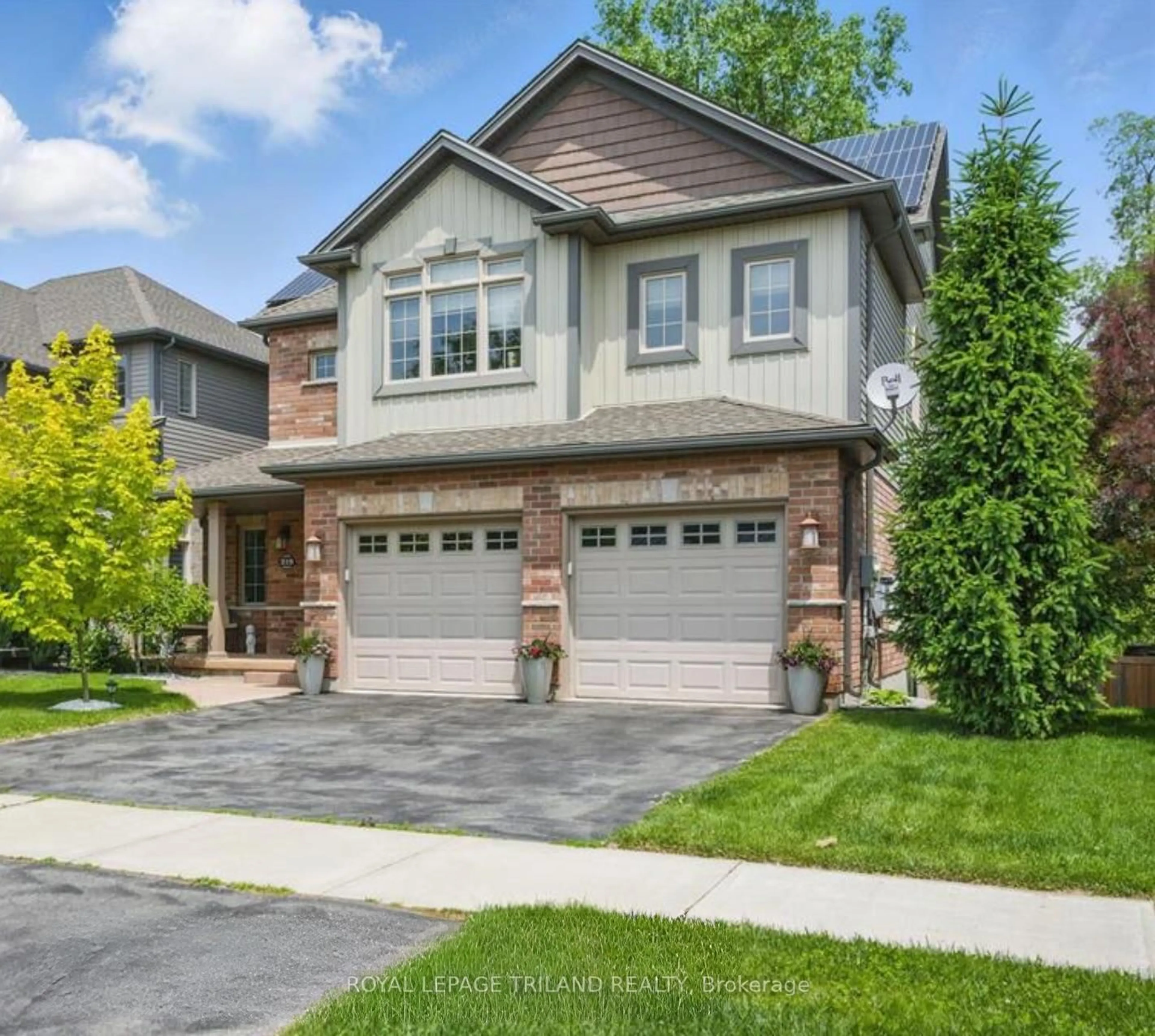 Home with brick exterior material, street for 219 Union Ave, Middlesex Centre Ontario N0L 1R0