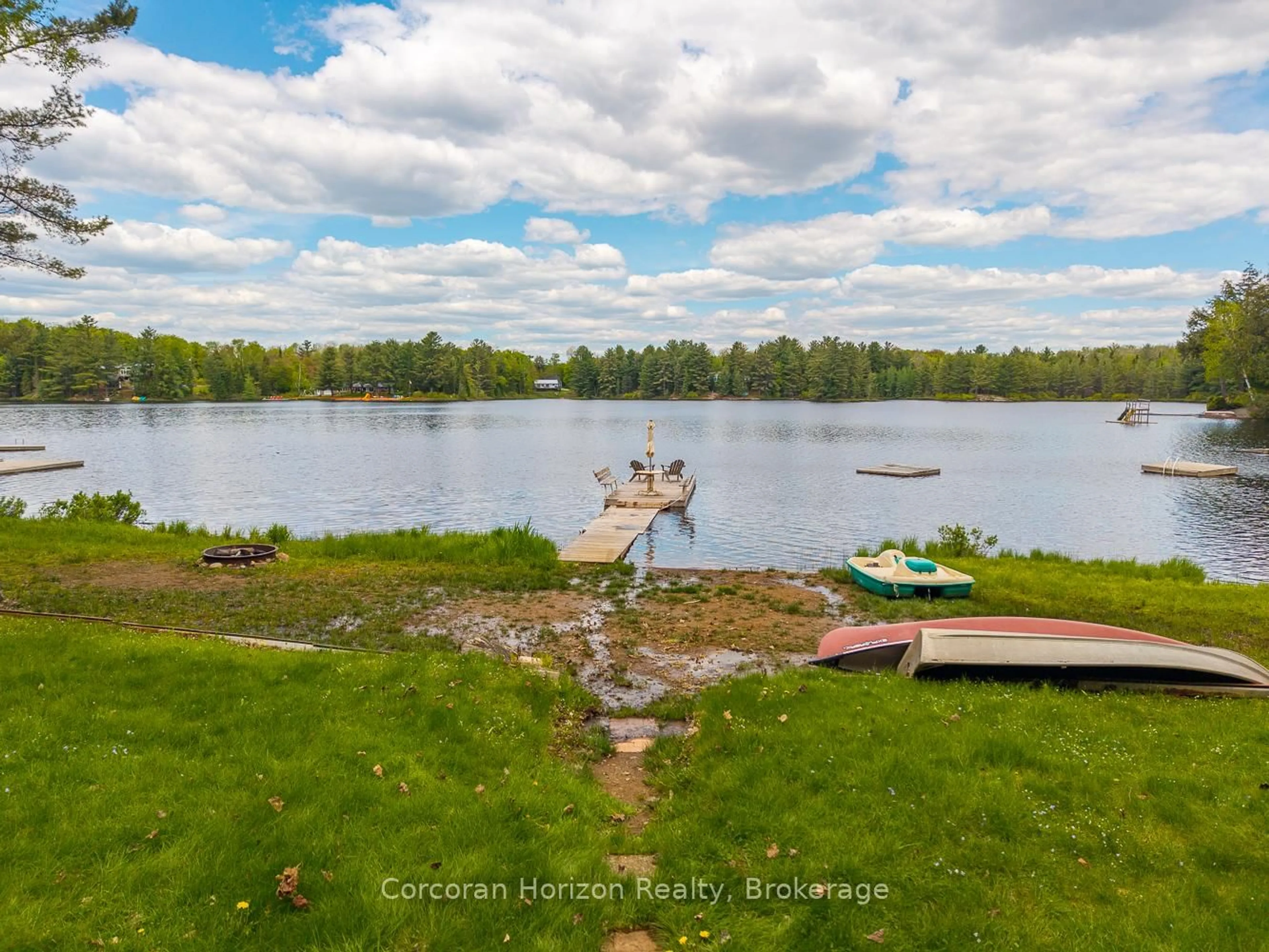 A pic from outside/outdoor area/front of a property/back of a property/a pic from drone, water/lake/river/ocean view for 247 Mainhood Rd, Huntsville Ontario P0B 1M0