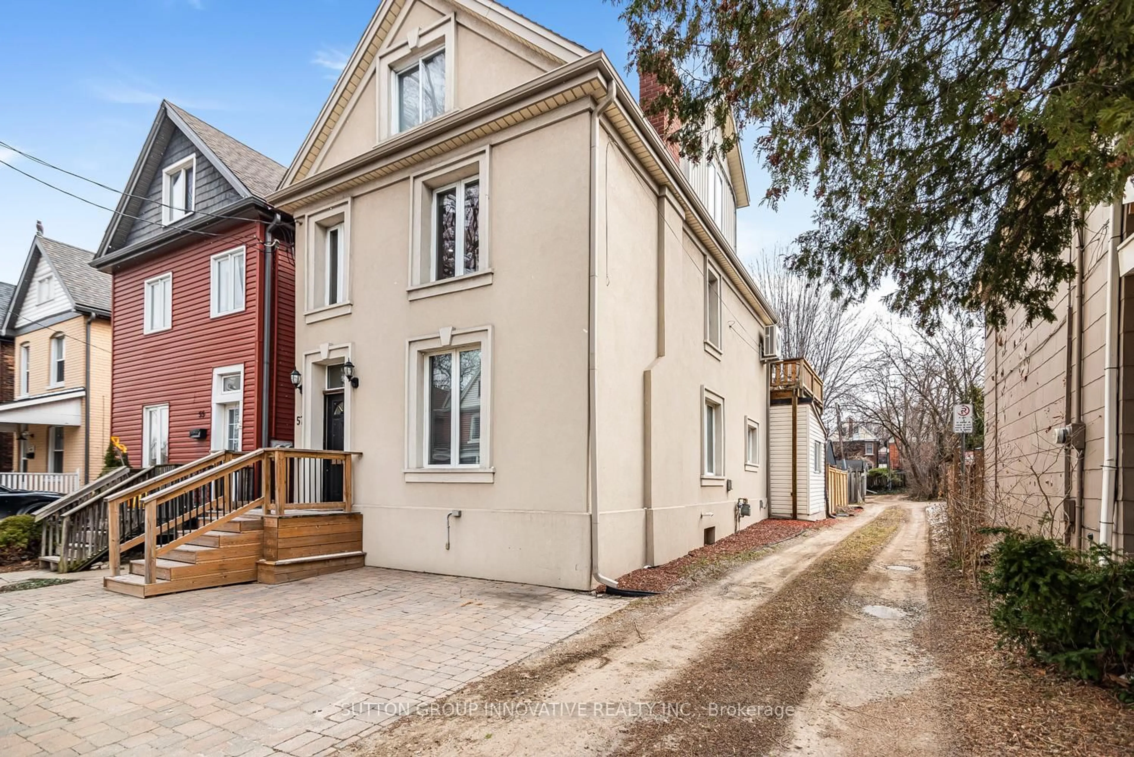 Home with brick exterior material, street for 57 New St, Hamilton Ontario L8P 4J7