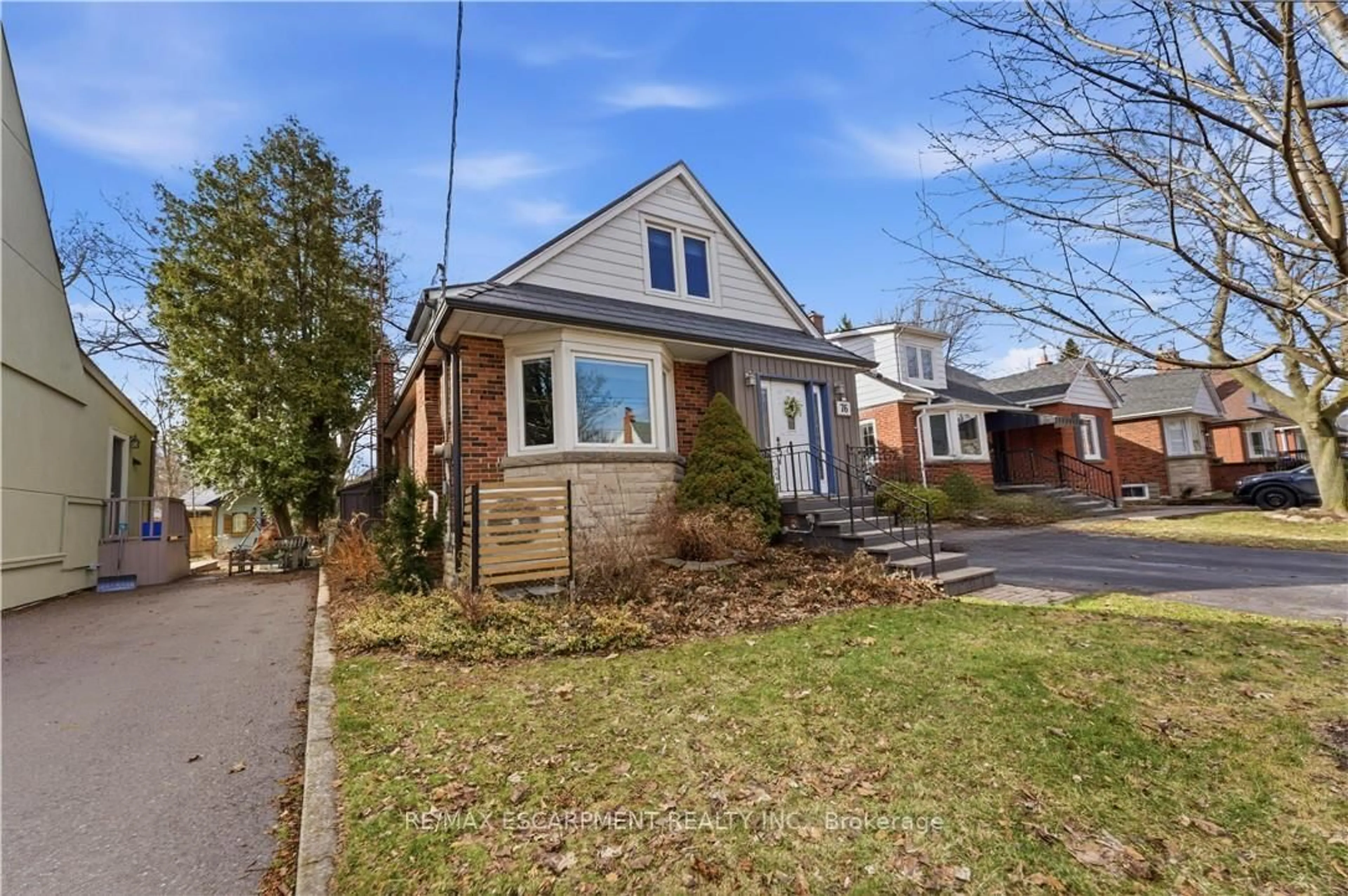 Home with brick exterior material, street for 76 Knyvet Ave, Hamilton Ontario L9A 3J5