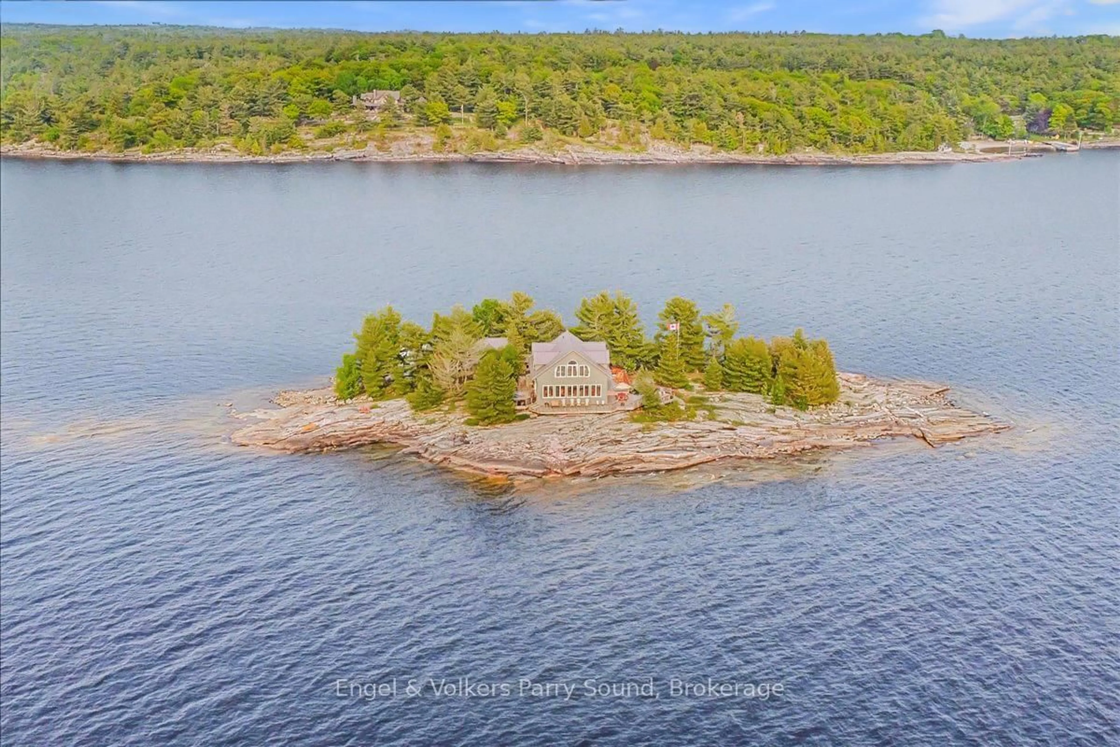 A pic from outside/outdoor area/front of a property/back of a property/a pic from drone, water/lake/river/ocean view for 1 Three Tree Island, McDougall Ontario P0G 1G0