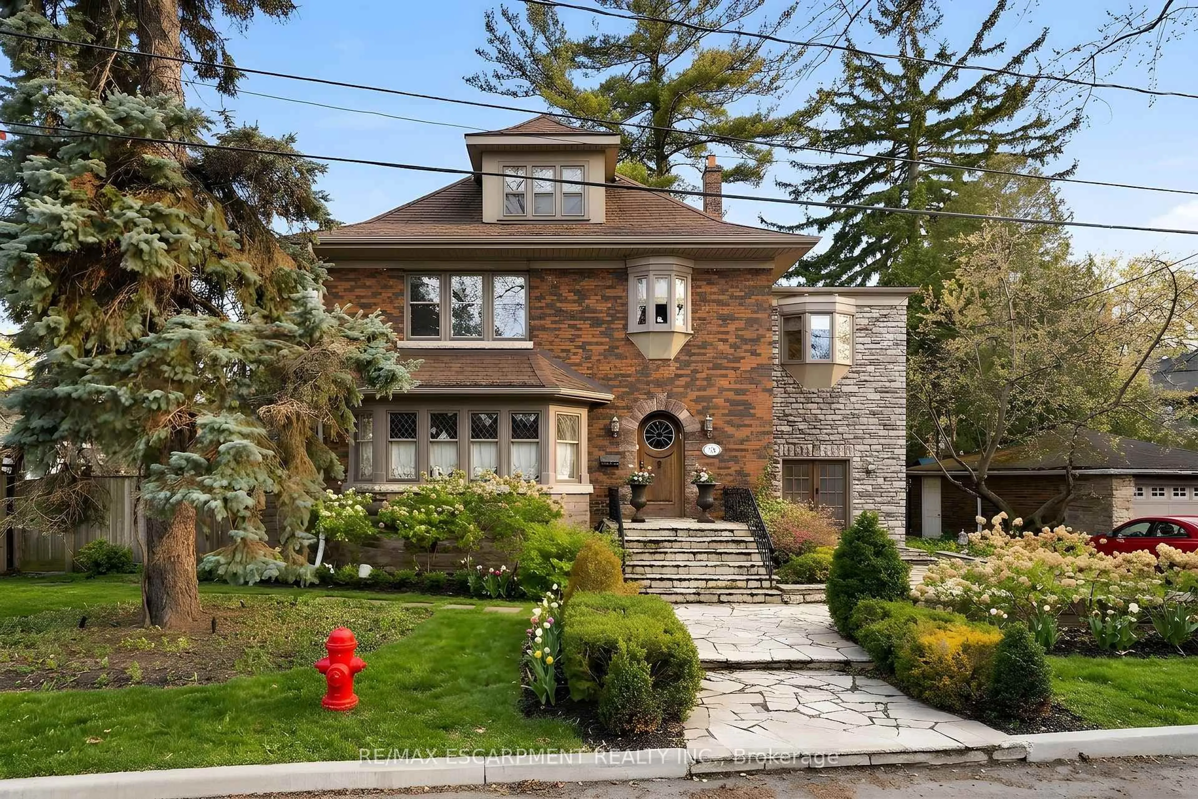 Home with brick exterior material, street for 74 OAK KNOLL Dr, Hamilton Ontario L8S 4C4