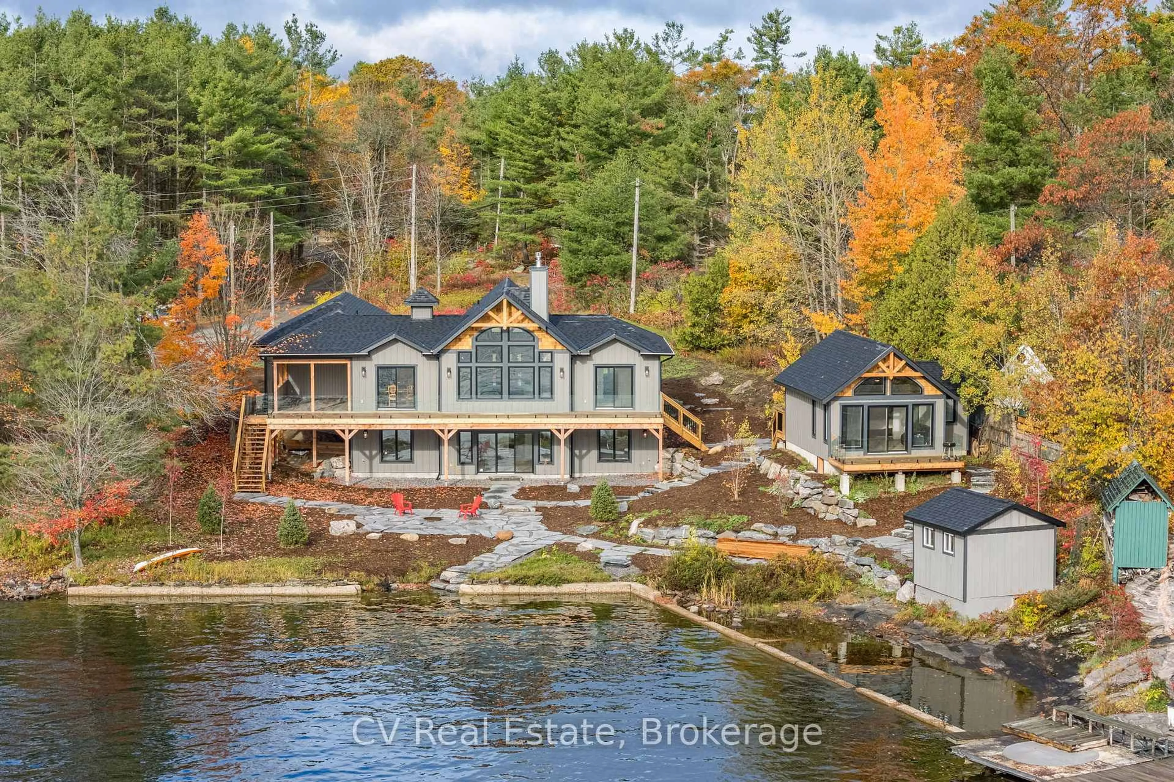 A pic from outside/outdoor area/front of a property/back of a property/a pic from drone, water/lake/river/ocean view for 1111 Lakeshore Dr, Gravenhurst Ontario P1P 1R2
