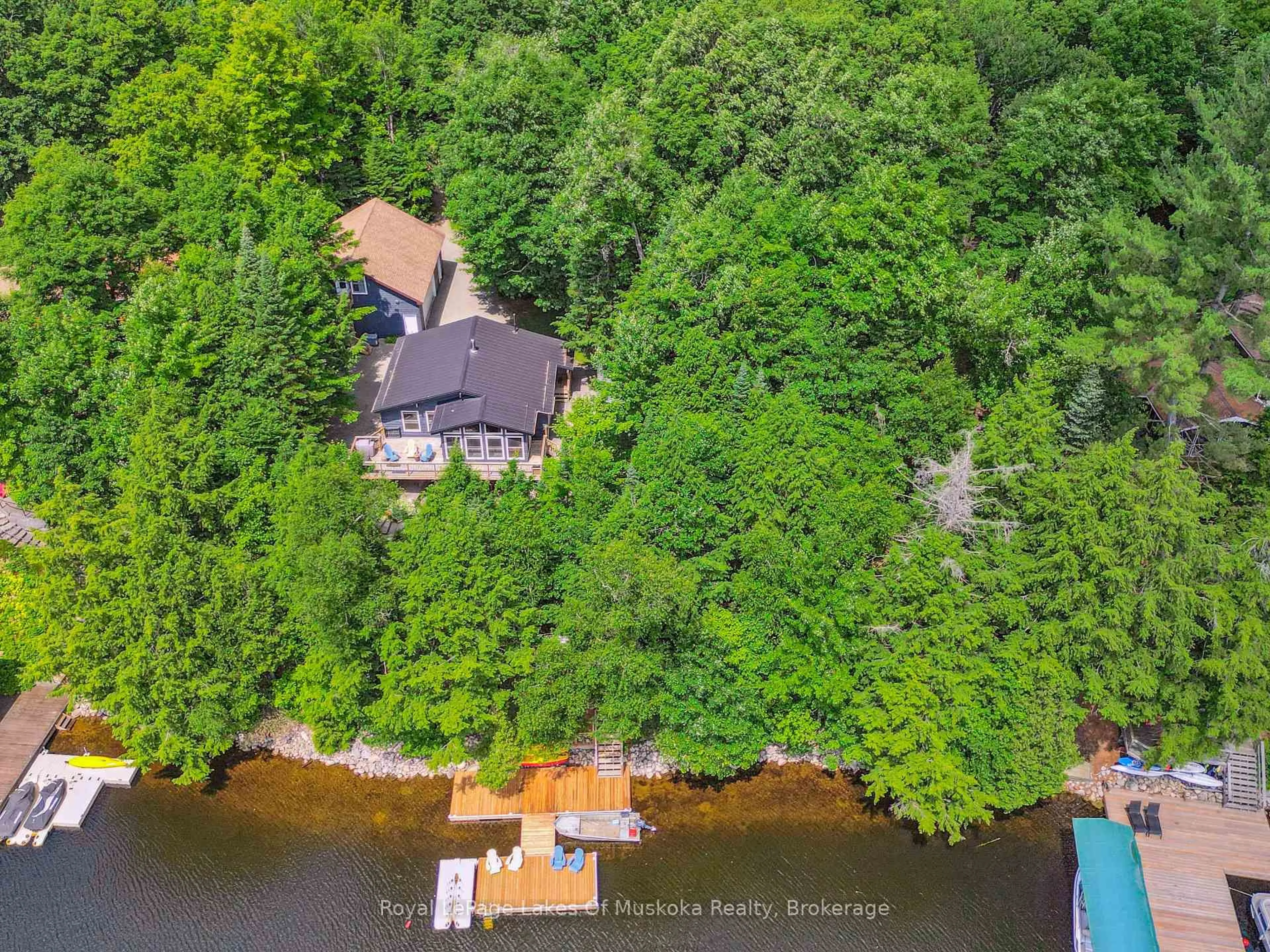 A pic from outside/outdoor area/front of a property/back of a property/a pic from drone, water/lake/river/ocean view for 1315 Wolf Circ, Algonquin Highlands Ontario P0A 1E0